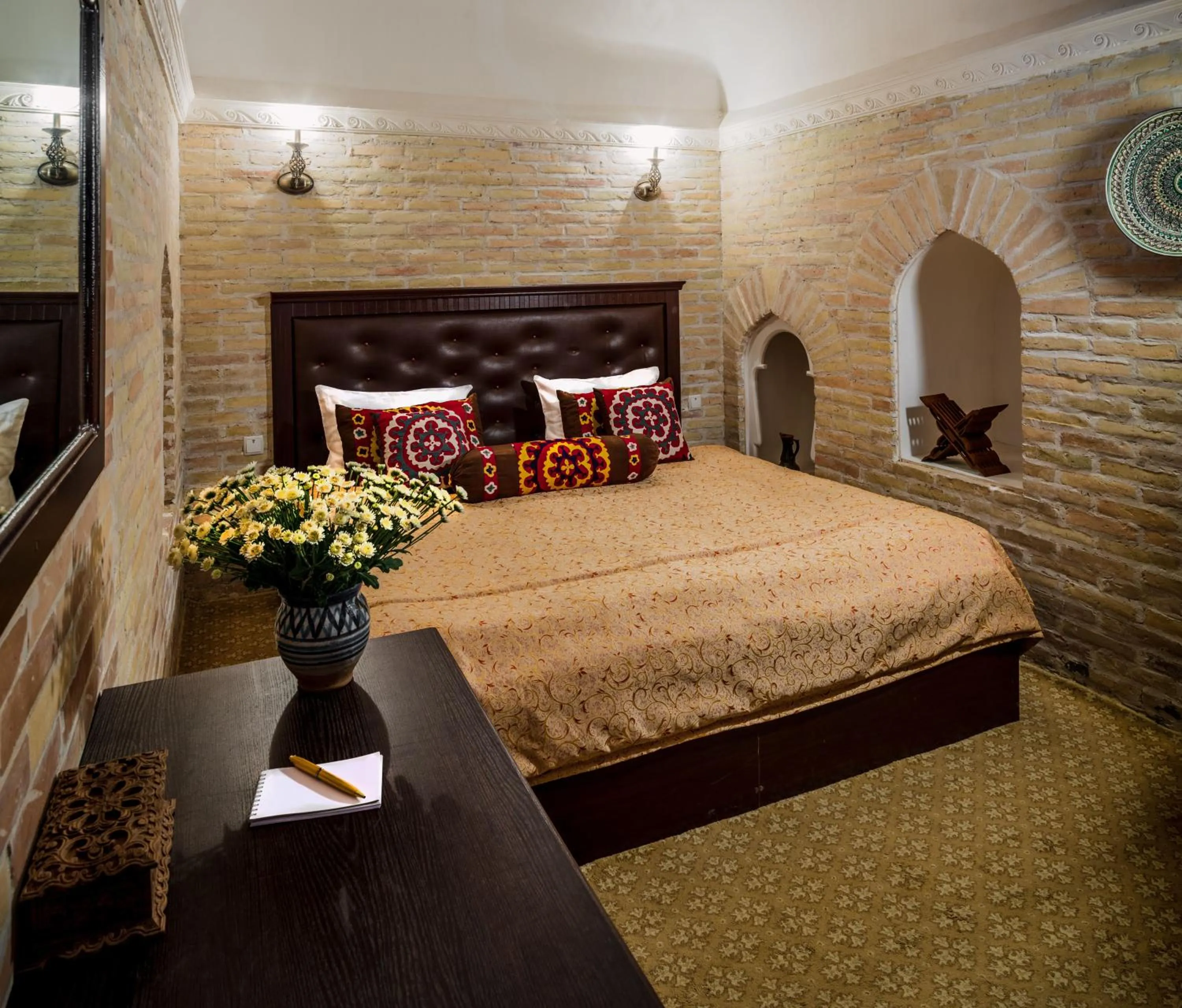 Bed in Orient Star Khiva Hotel- Madrasah Muhammad Aminkhan 1855