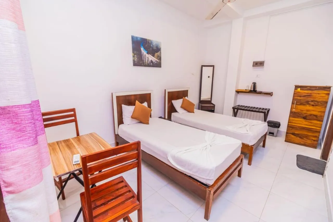 Bed in Cinnamon Airport Residencies