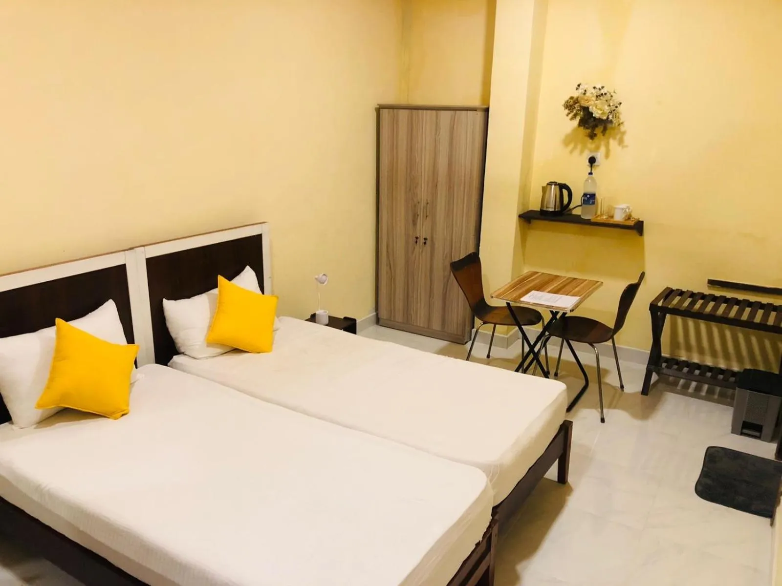 Bed in Cinnamon Airport Residencies