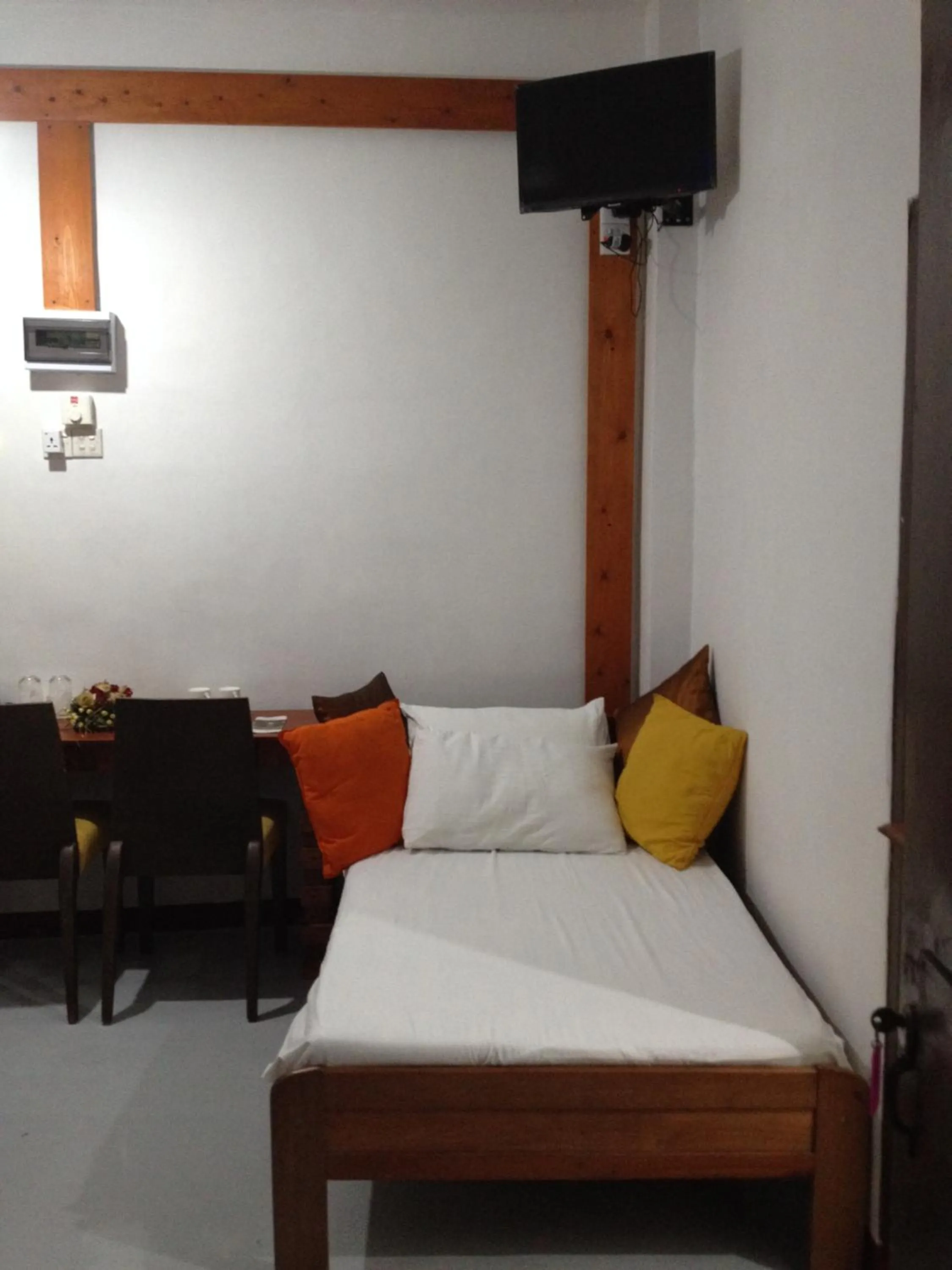 Bed in Cinnamon Airport Residencies