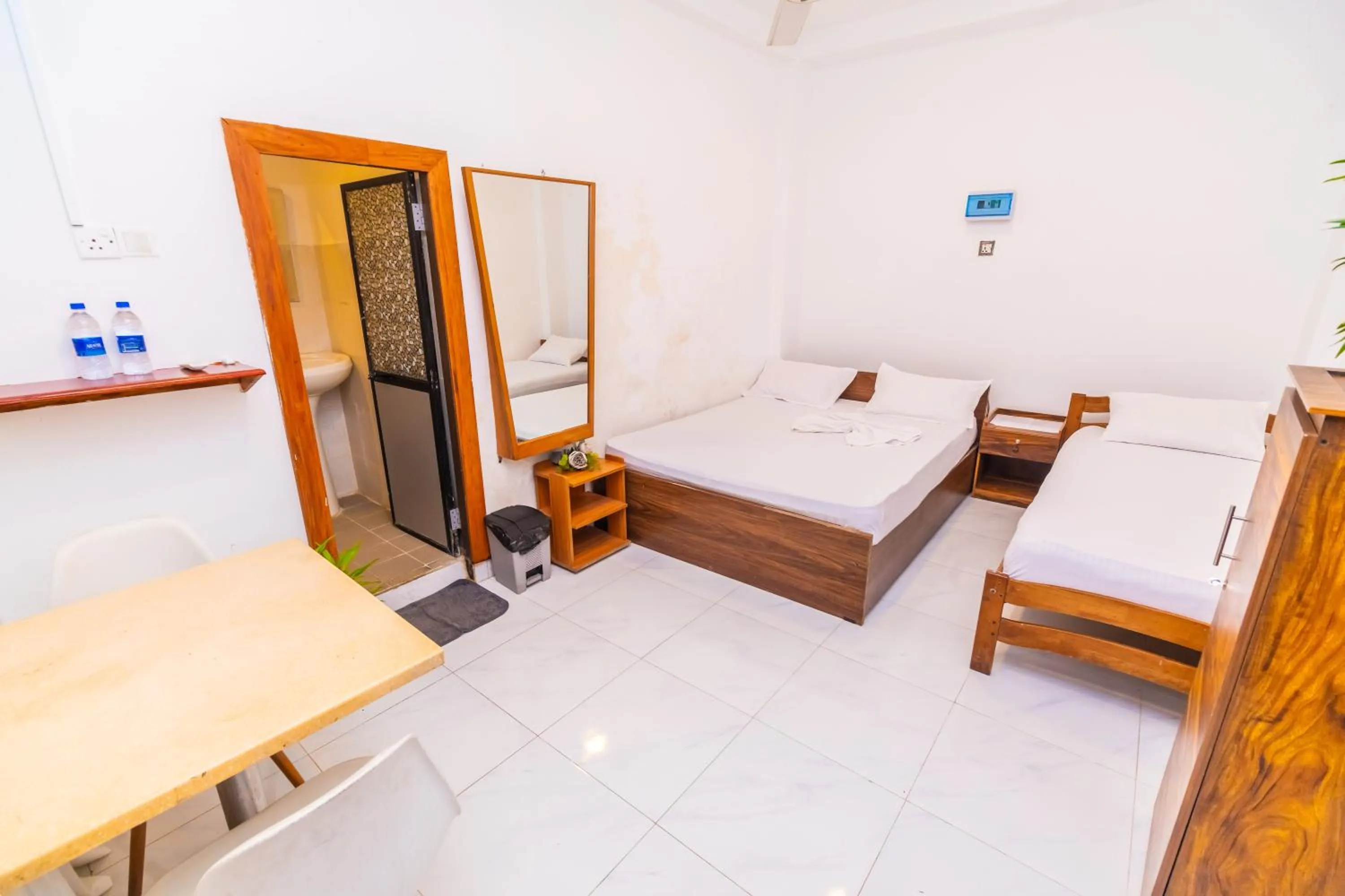 Bed in Cinnamon Airport Residencies