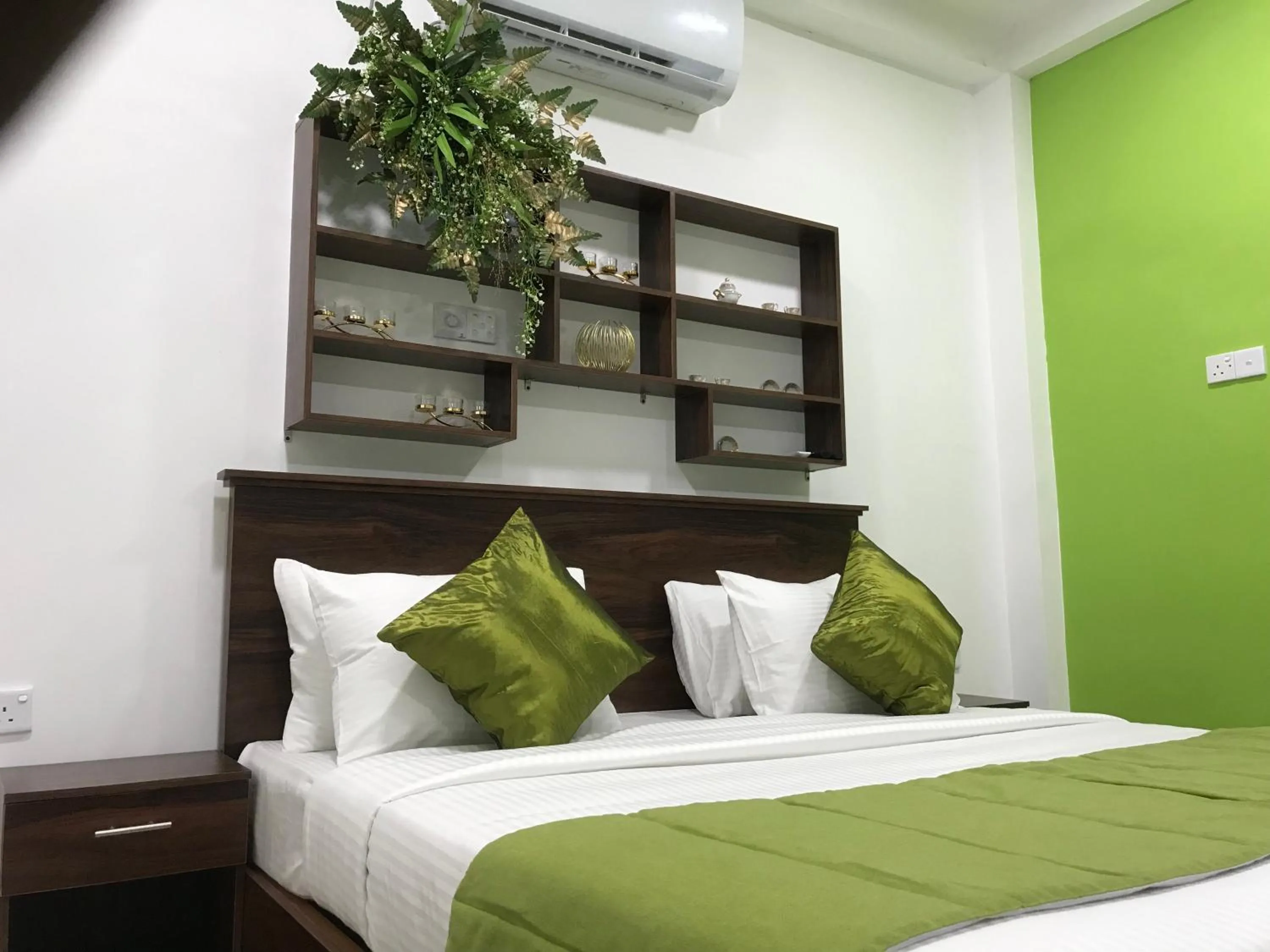 Bed in Cinnamon Airport Residencies