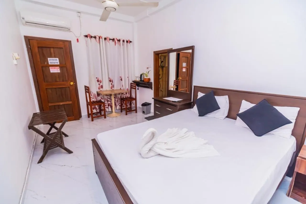 Bed in Cinnamon Airport Residencies