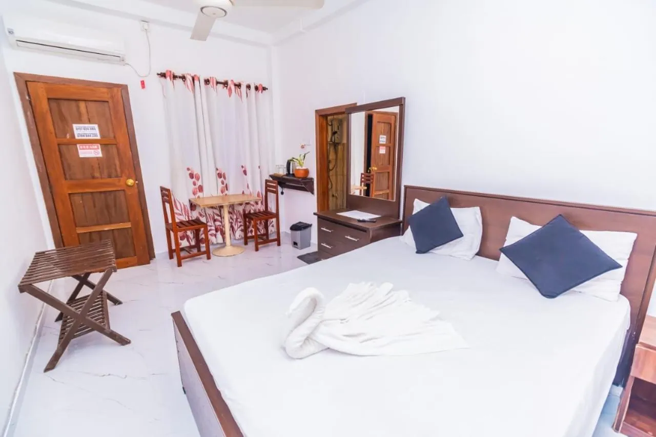 Bed in Cinnamon Airport Residencies