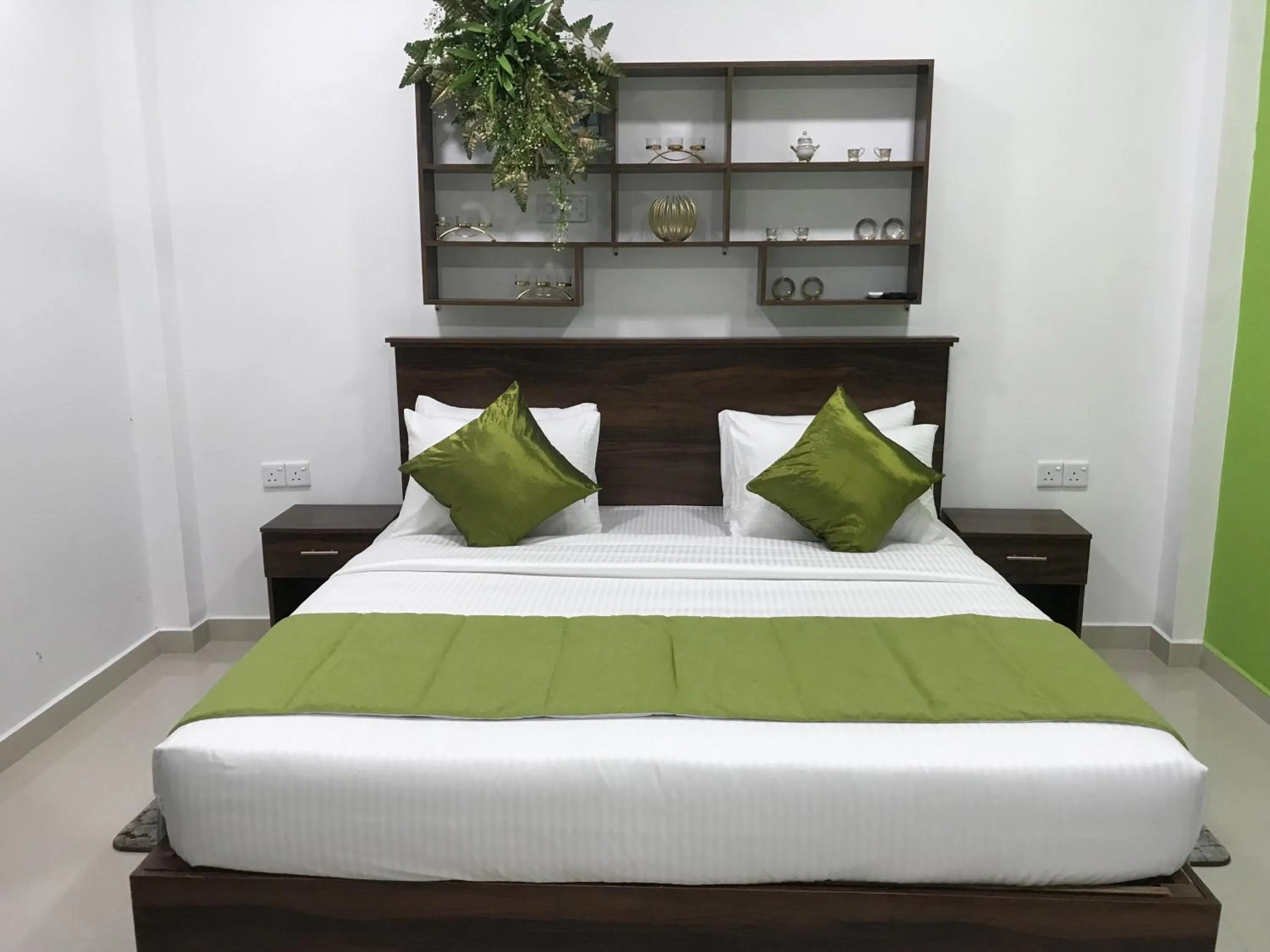 Bed in Cinnamon Airport Residencies