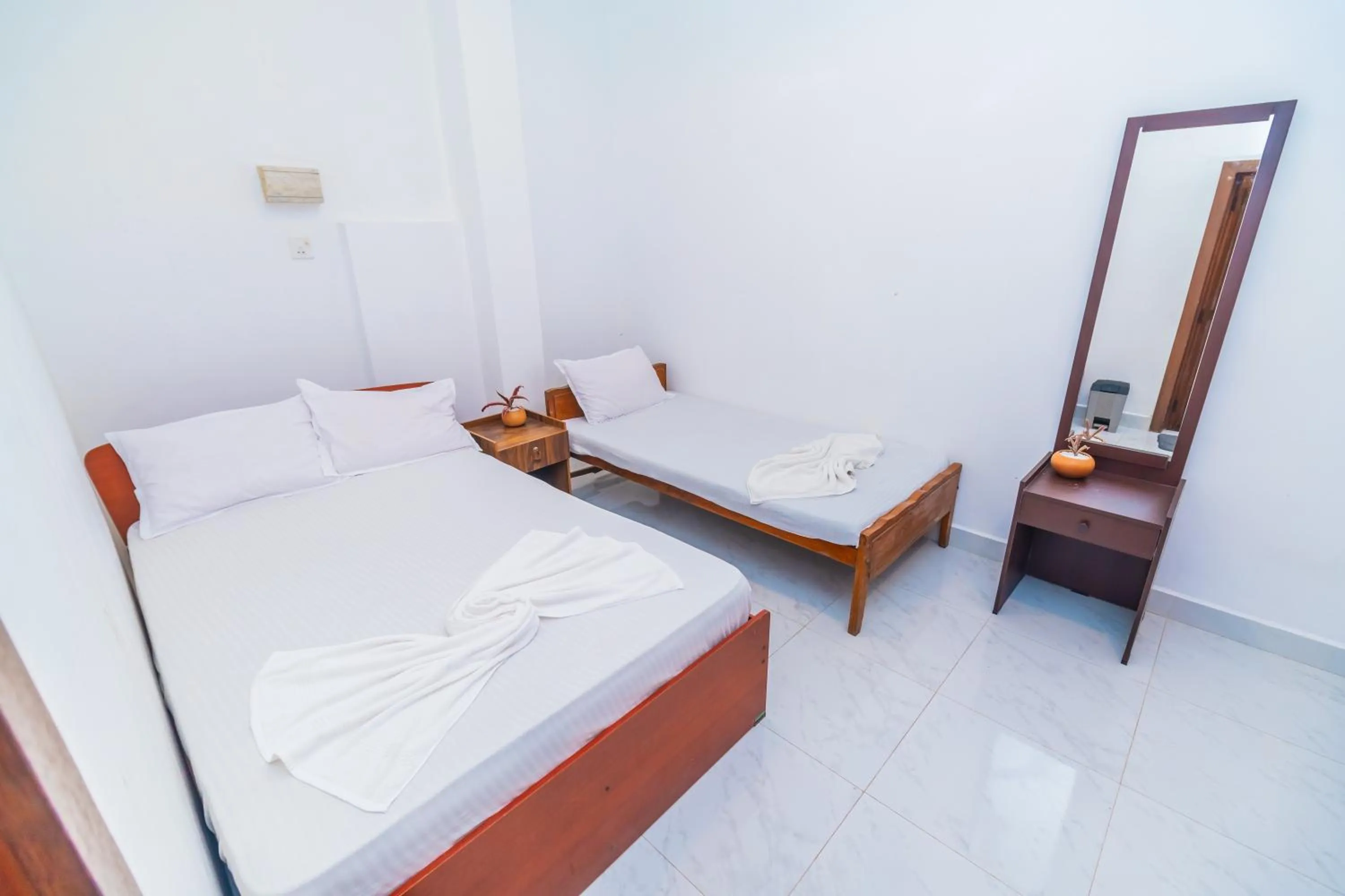 Bed in Cinnamon Airport Residencies