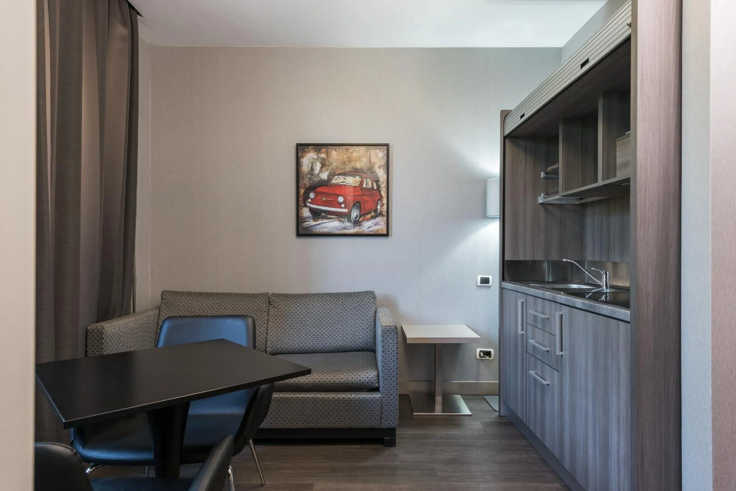 Kitchen or kitchenette in Noba Hotel e Residenze