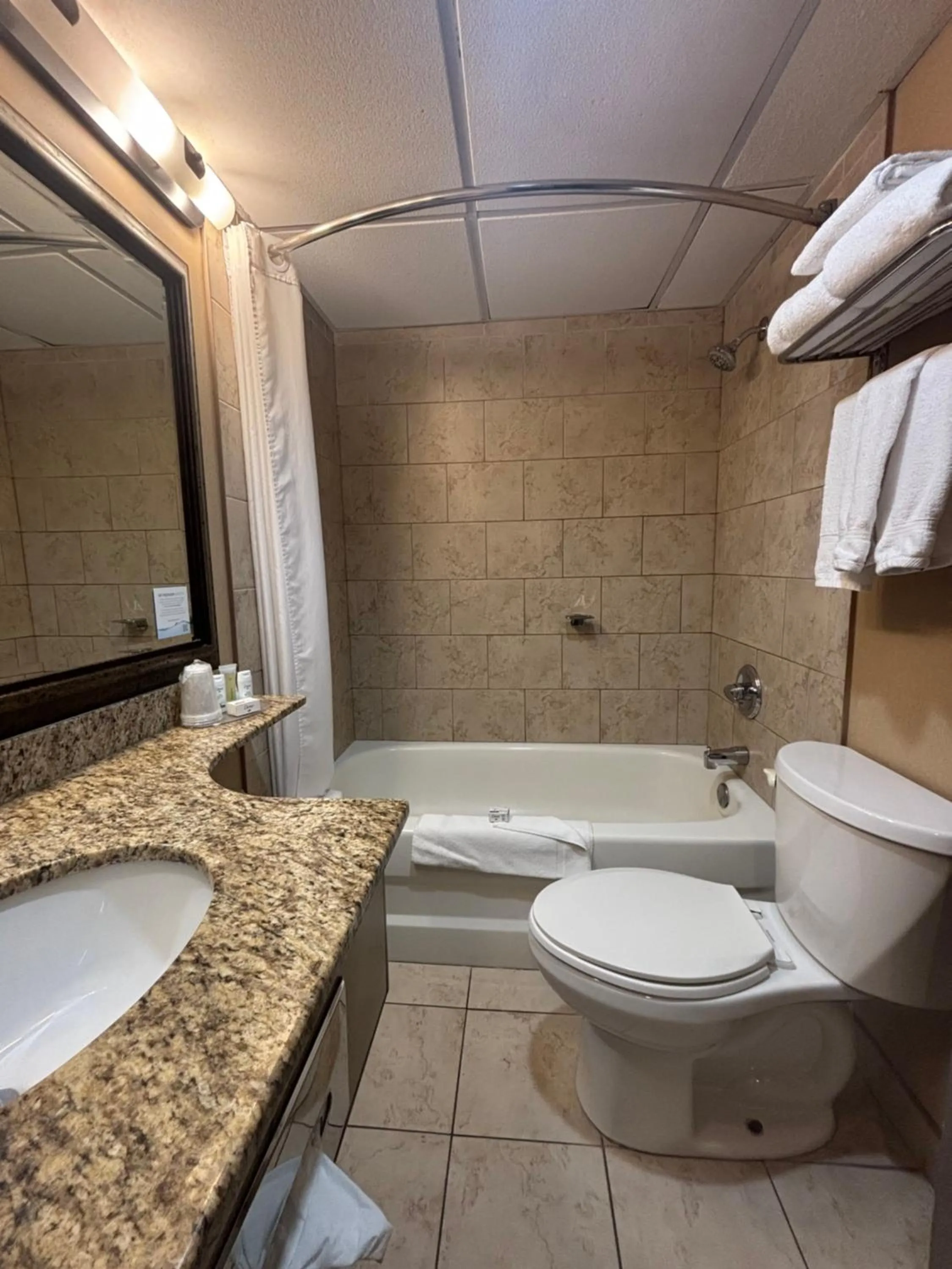 Bathroom in Super 8 by Wyndham Macleod Trail Calgary