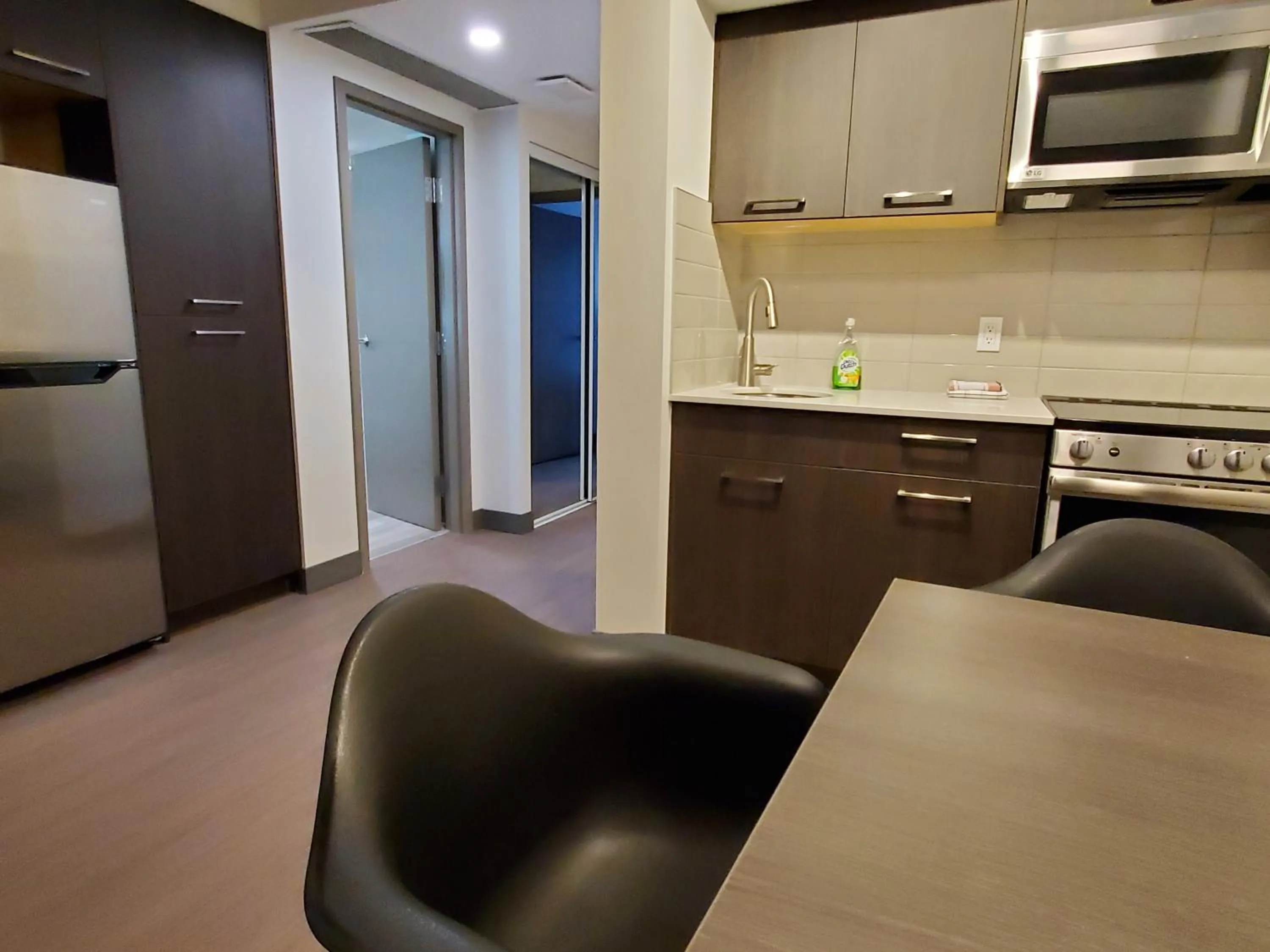 Kitchen or kitchenette in Super 8 by Wyndham Macleod Trail Calgary