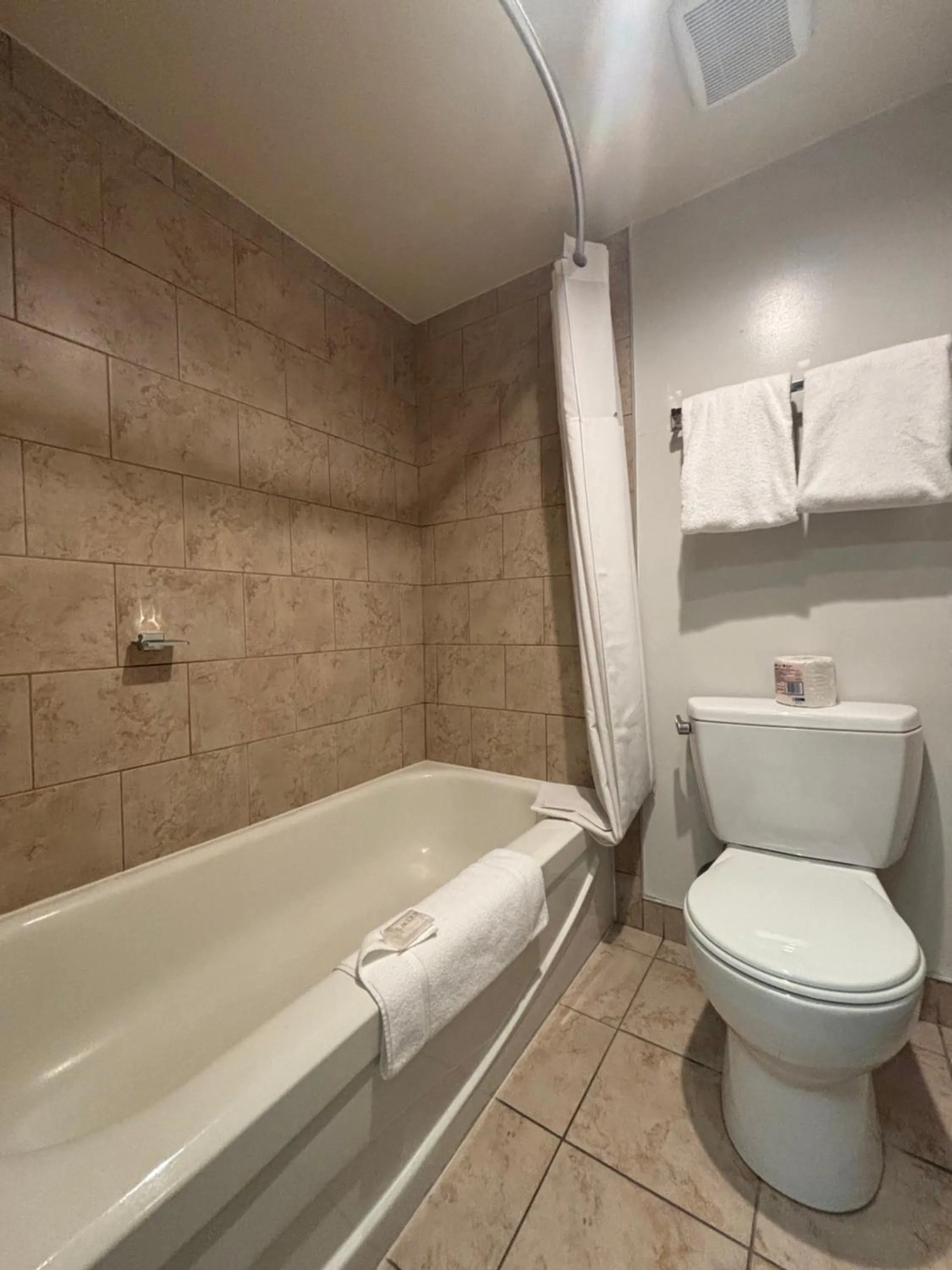 Bathroom in Super 8 by Wyndham Macleod Trail Calgary