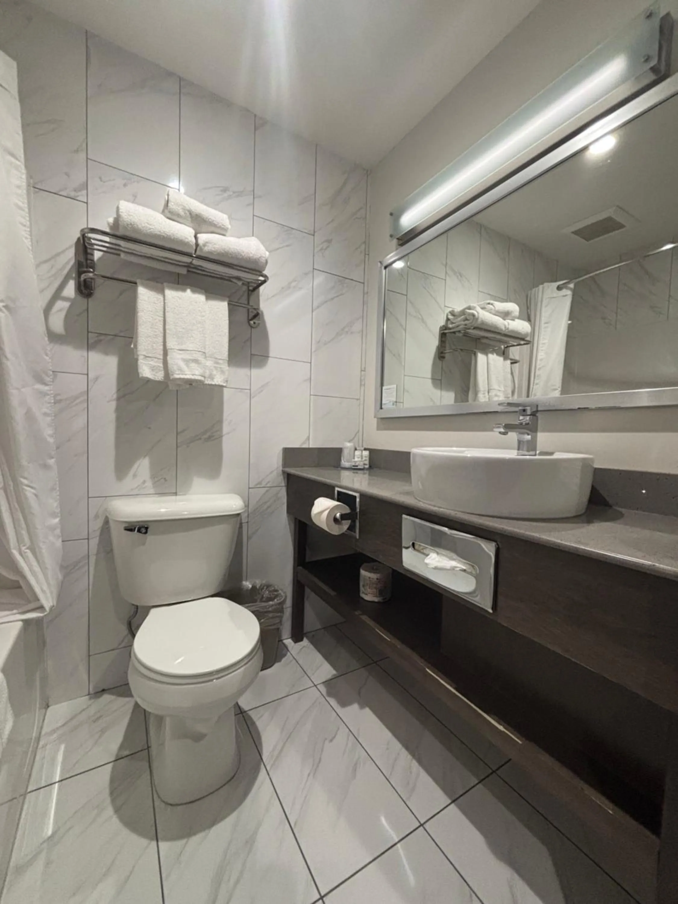 Bathroom in Super 8 by Wyndham Macleod Trail Calgary