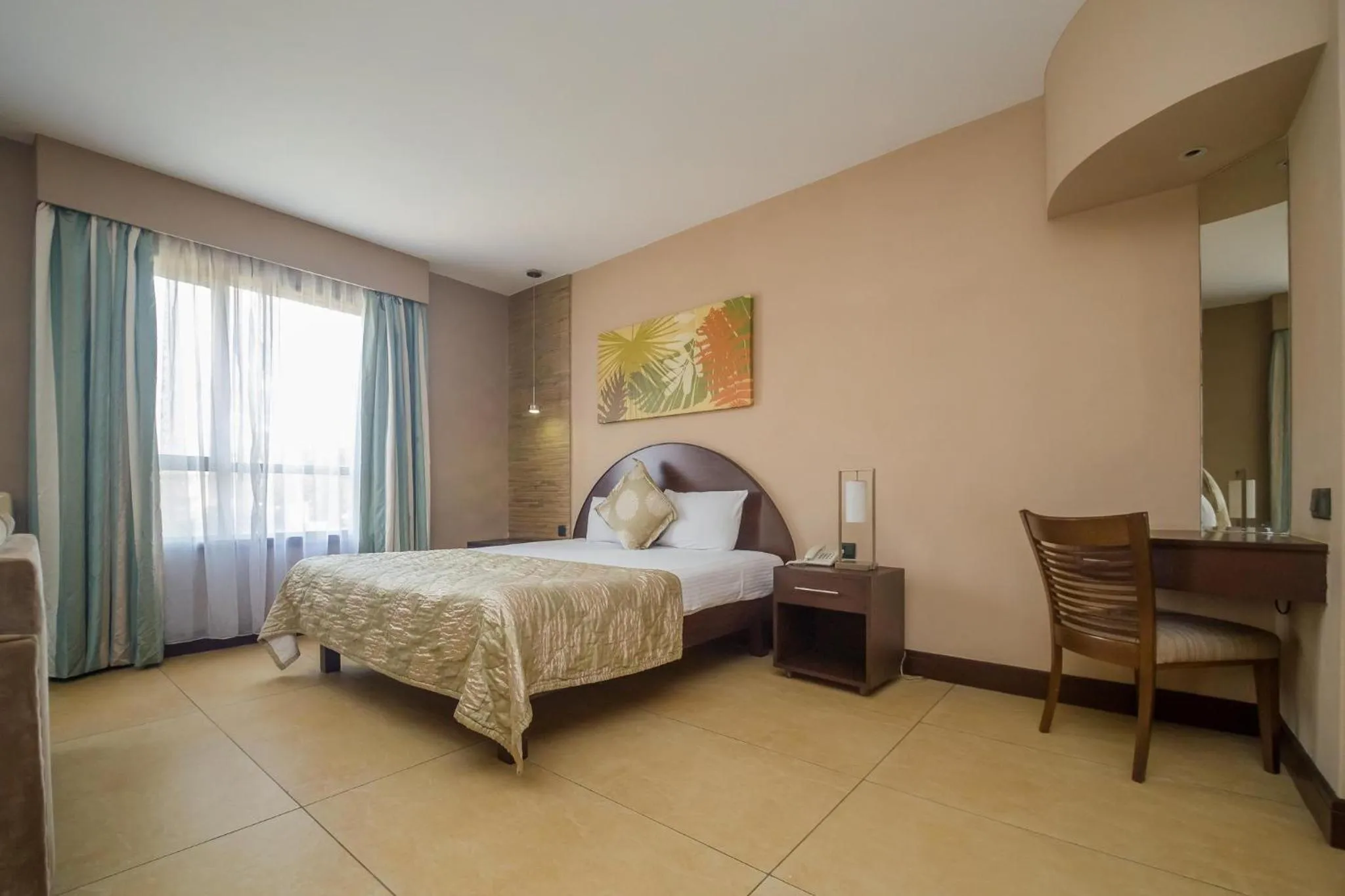 Photo of the whole room, Bed in Taarifa Suites by Dunhill Serviced Apartments