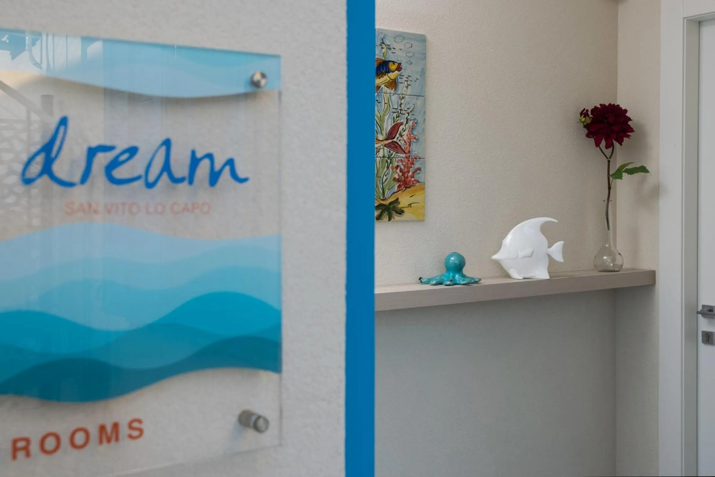 Property logo or sign in Reef and Dream