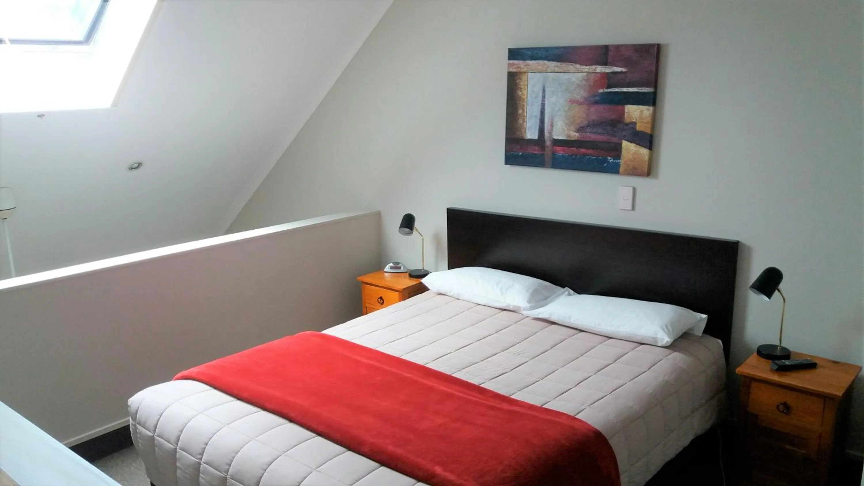 Bed in Bay Palm Motel