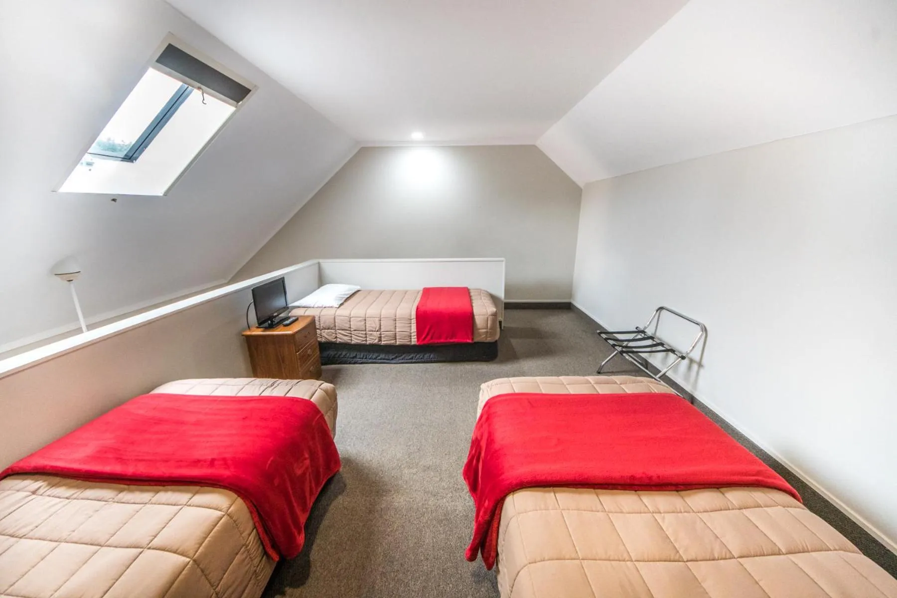 Bed in Bay Palm Motel