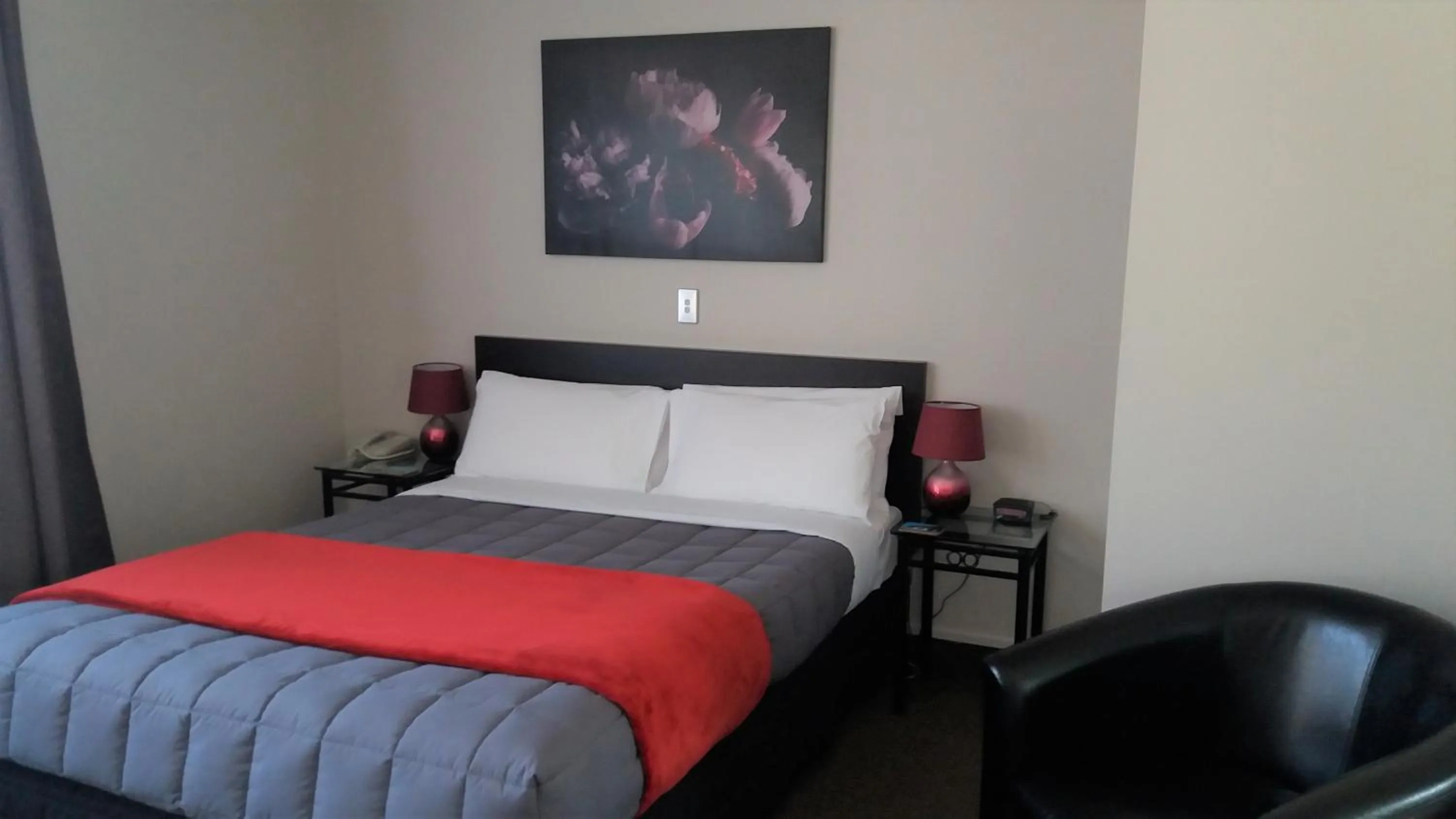 Bed in Bay Palm Motel