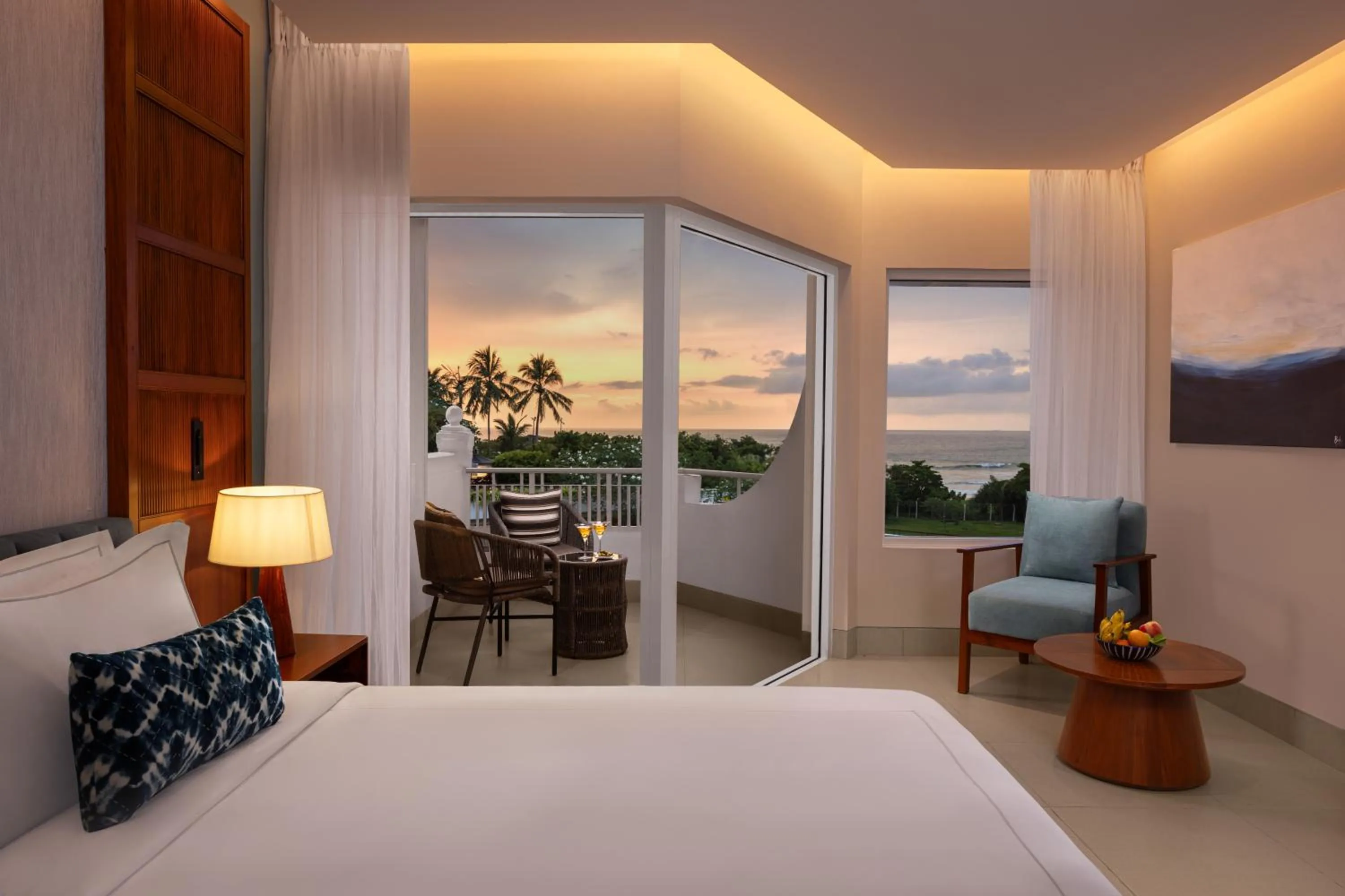 Seating area, Bed in Taj Bentota Resort & Spa