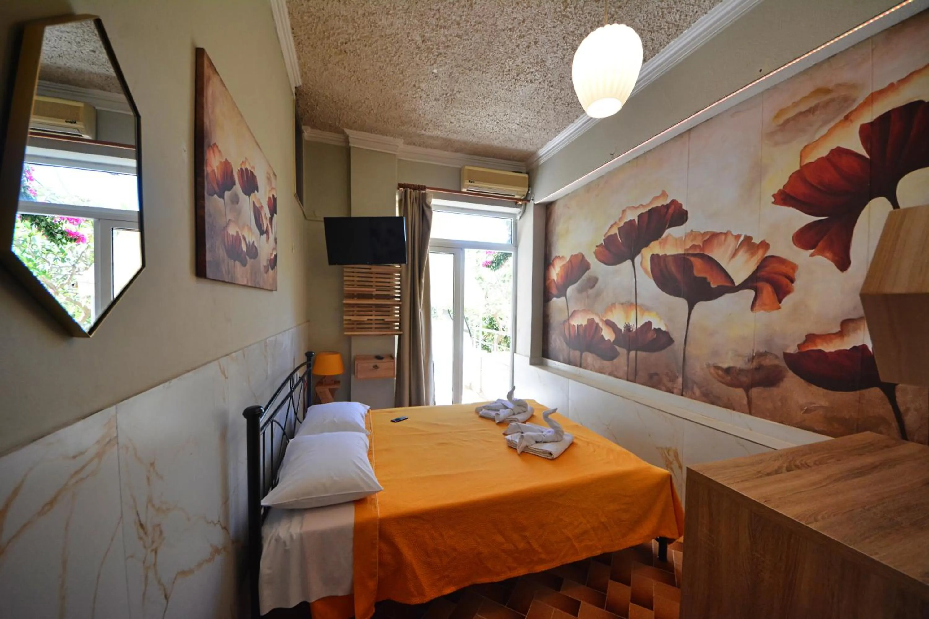 Bed in Bikakis Family Apartments