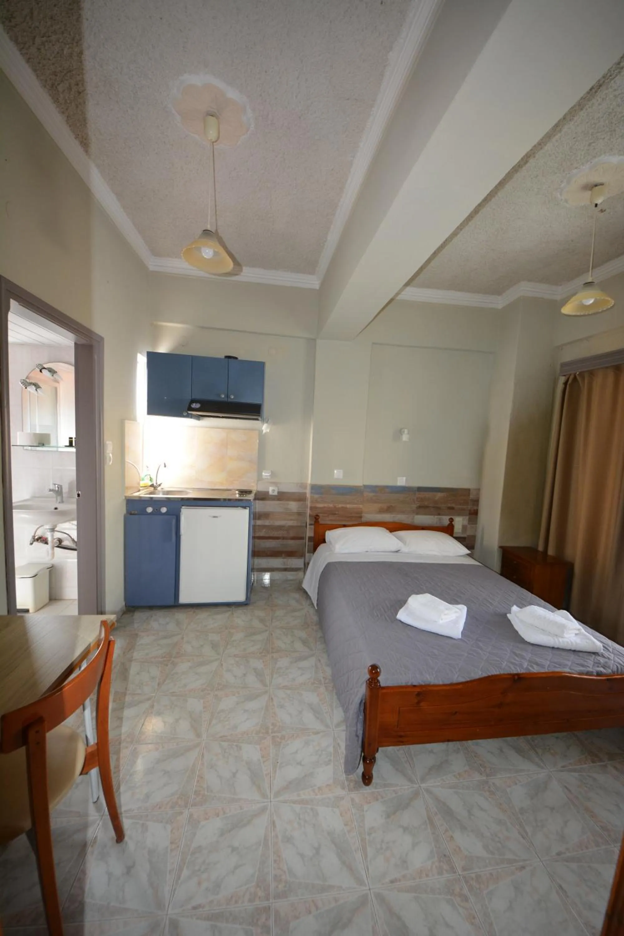 Bed in Bikakis Family Apartments