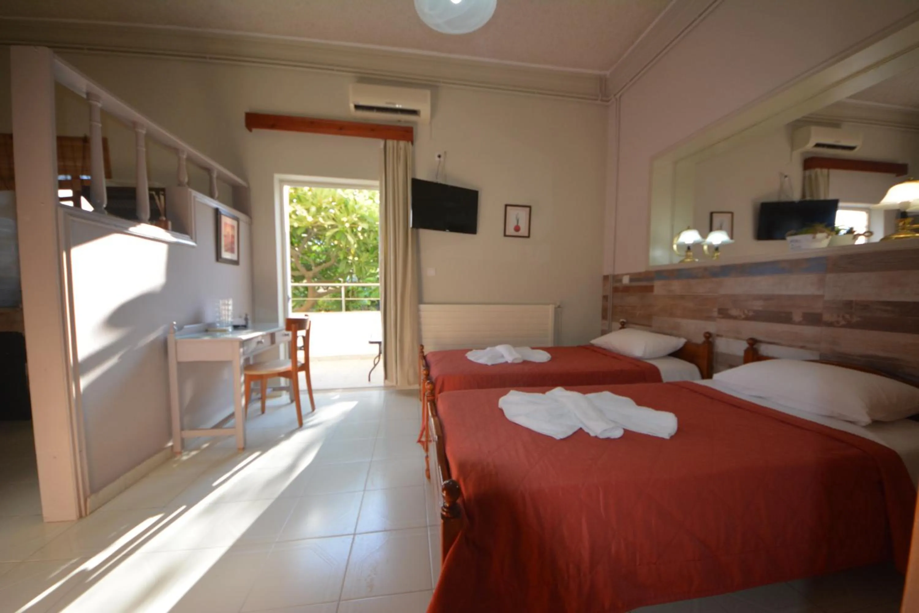 Bed in Bikakis Family Apartments