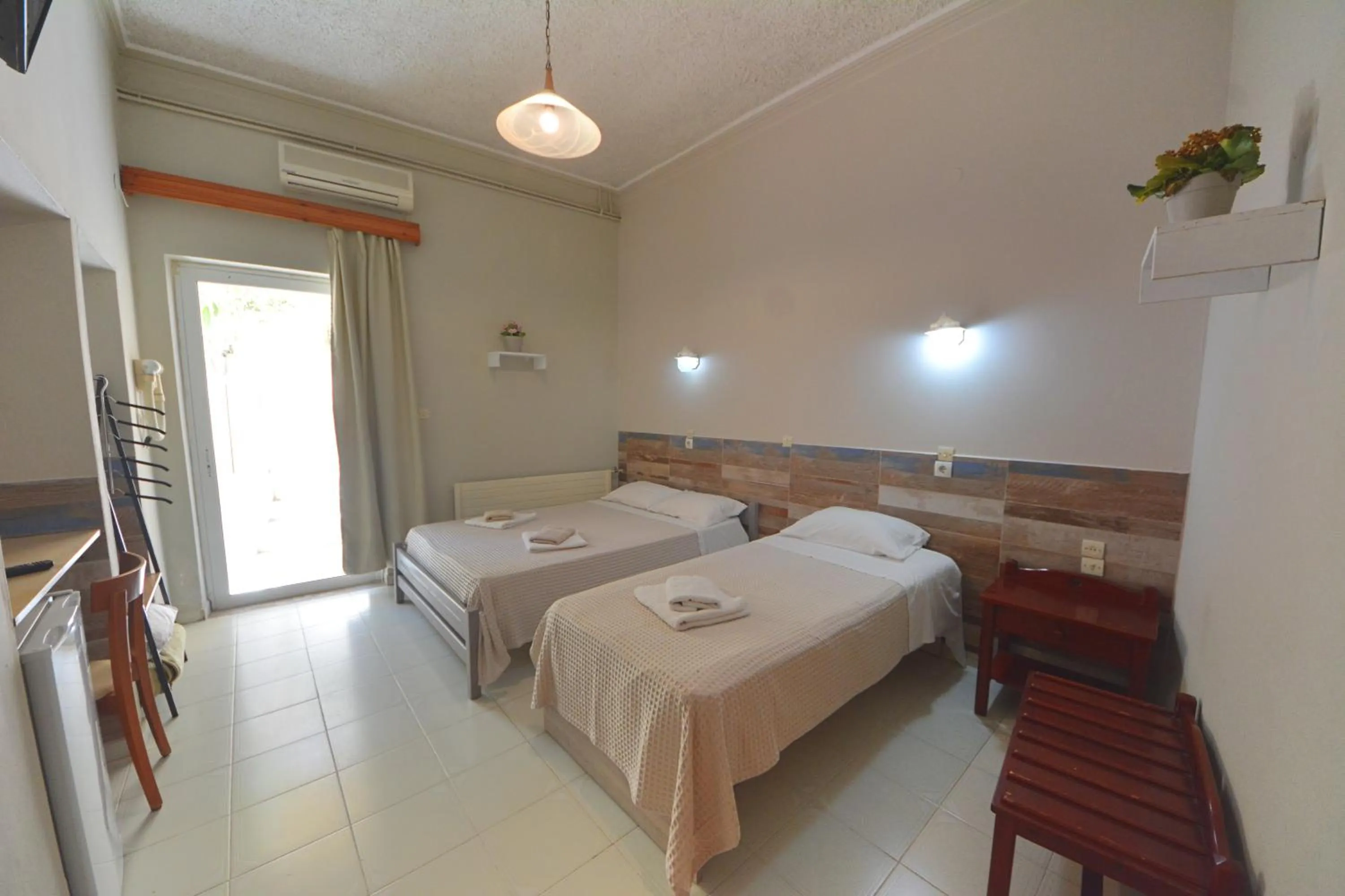 Bed in Bikakis Family Apartments