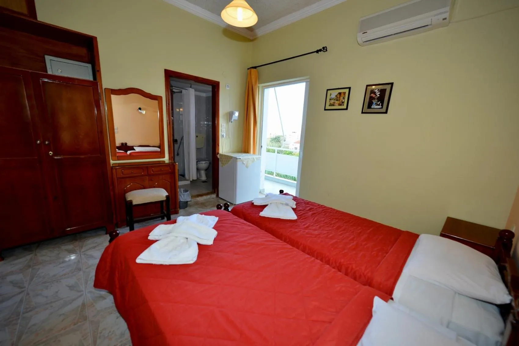 Bed in Bikakis Family Apartments