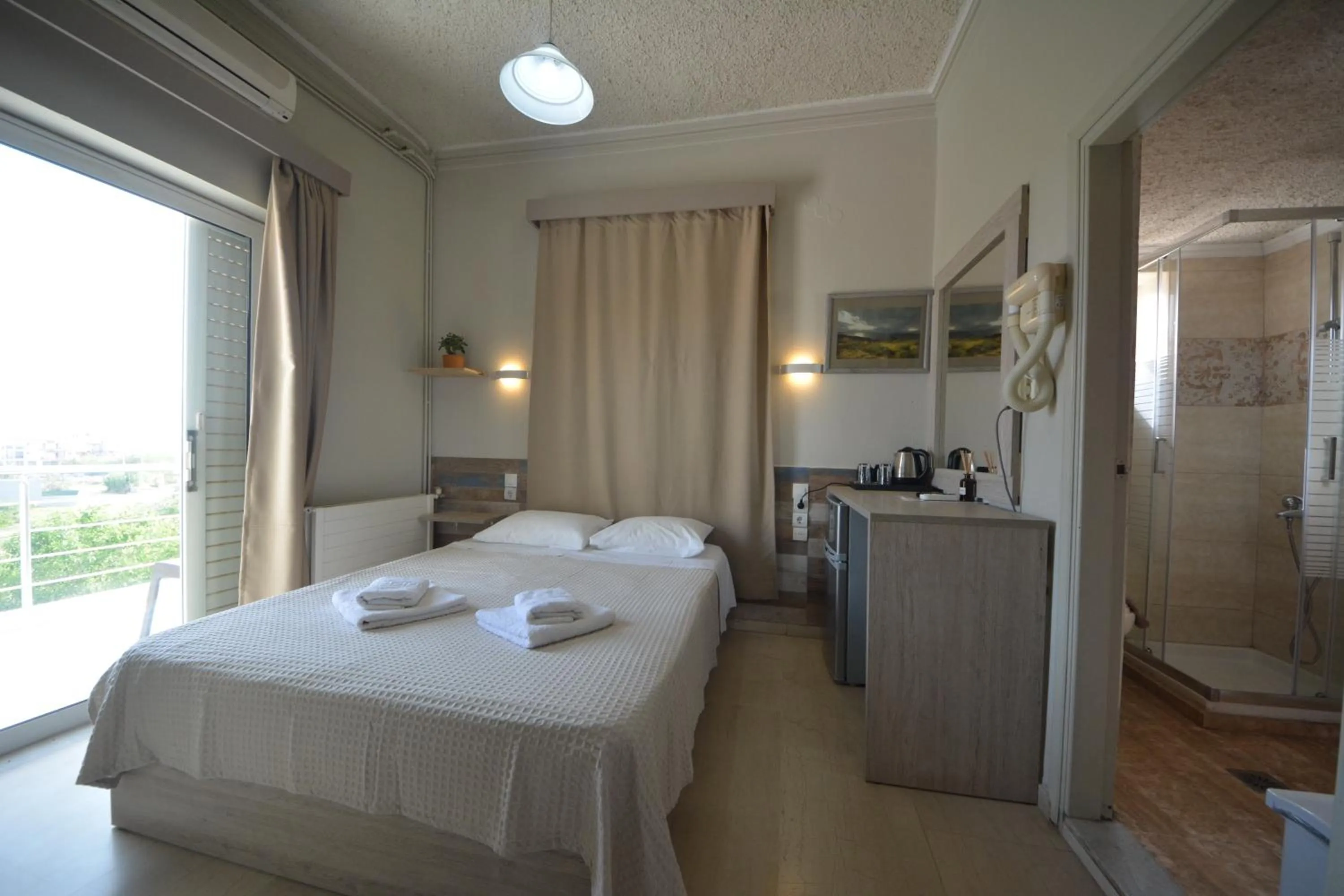 Bed in Bikakis Family Apartments