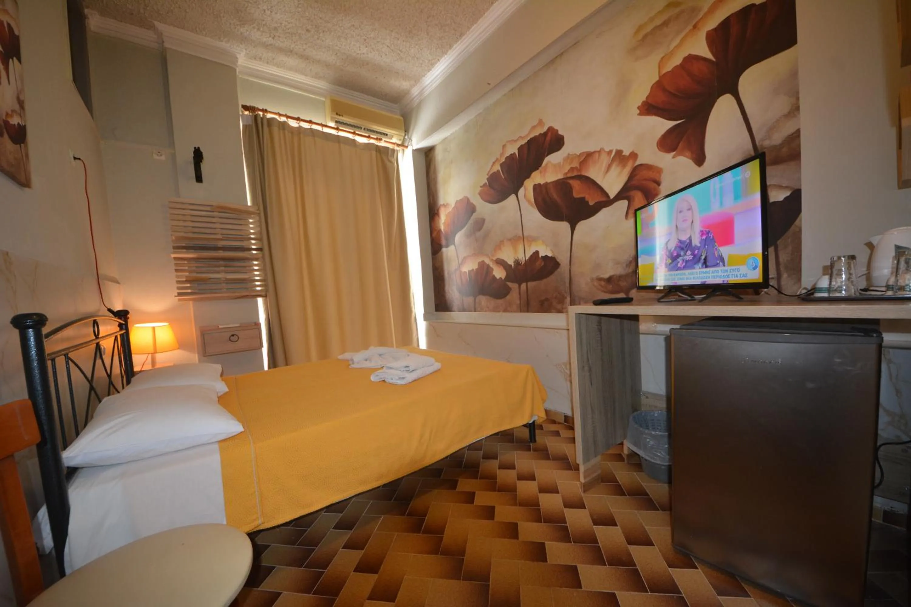 Bed in Bikakis Family Apartments