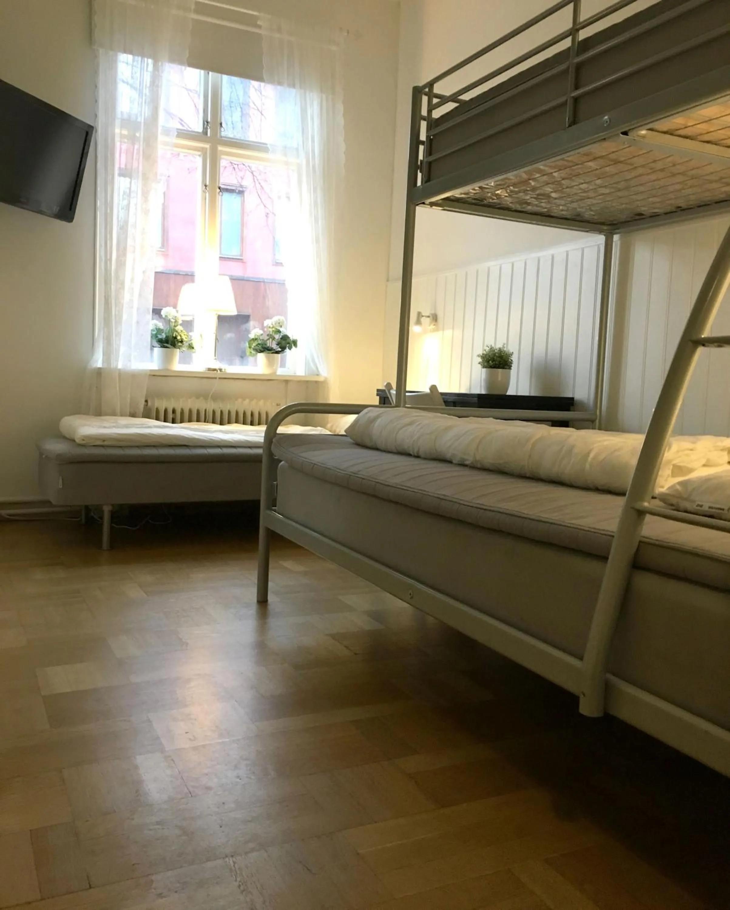 Photo of the whole room, Bed in Vandrarhem Uppsala Kungsängstorg