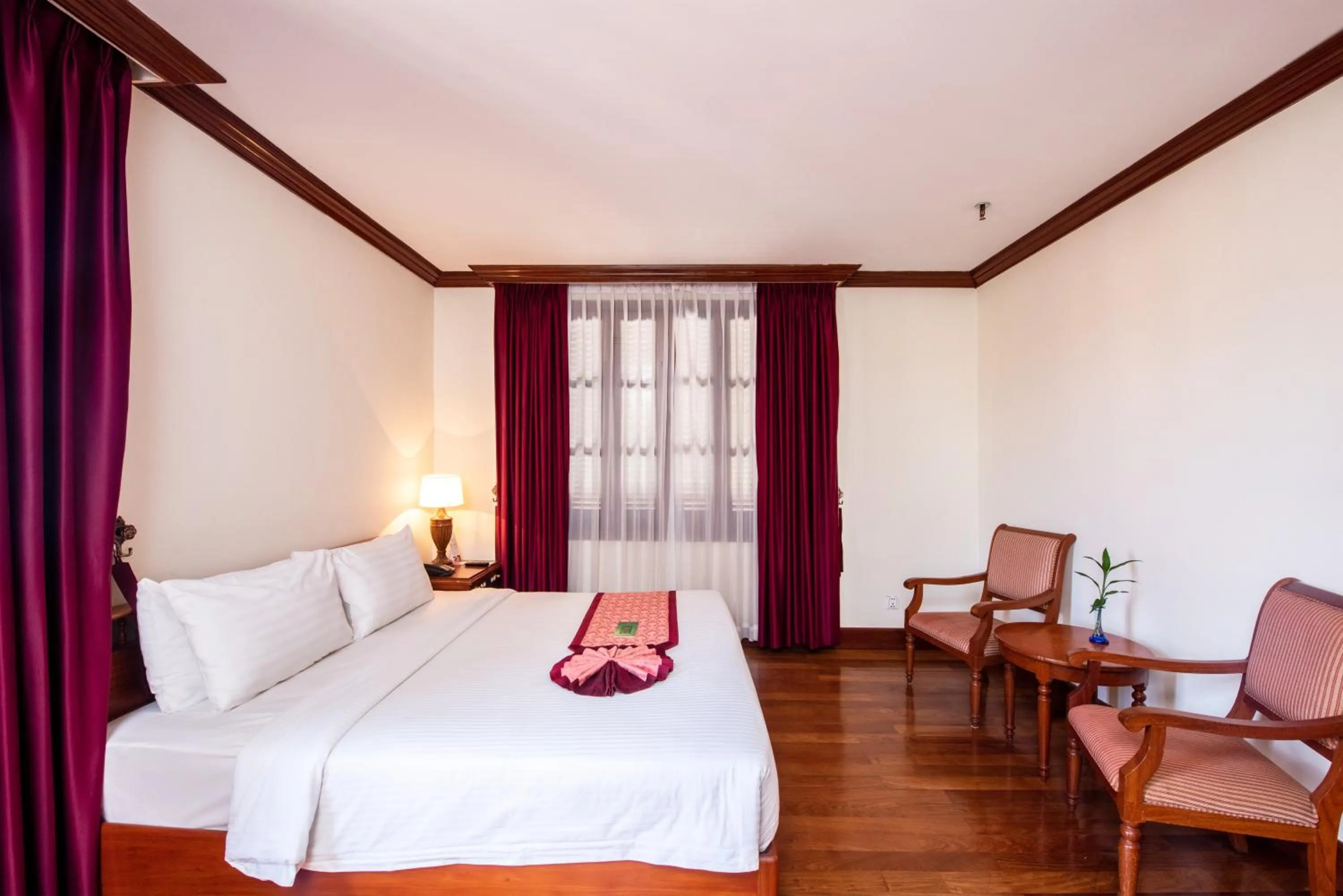 Photo of the whole room, Bed in Steung Siemreap Hotel