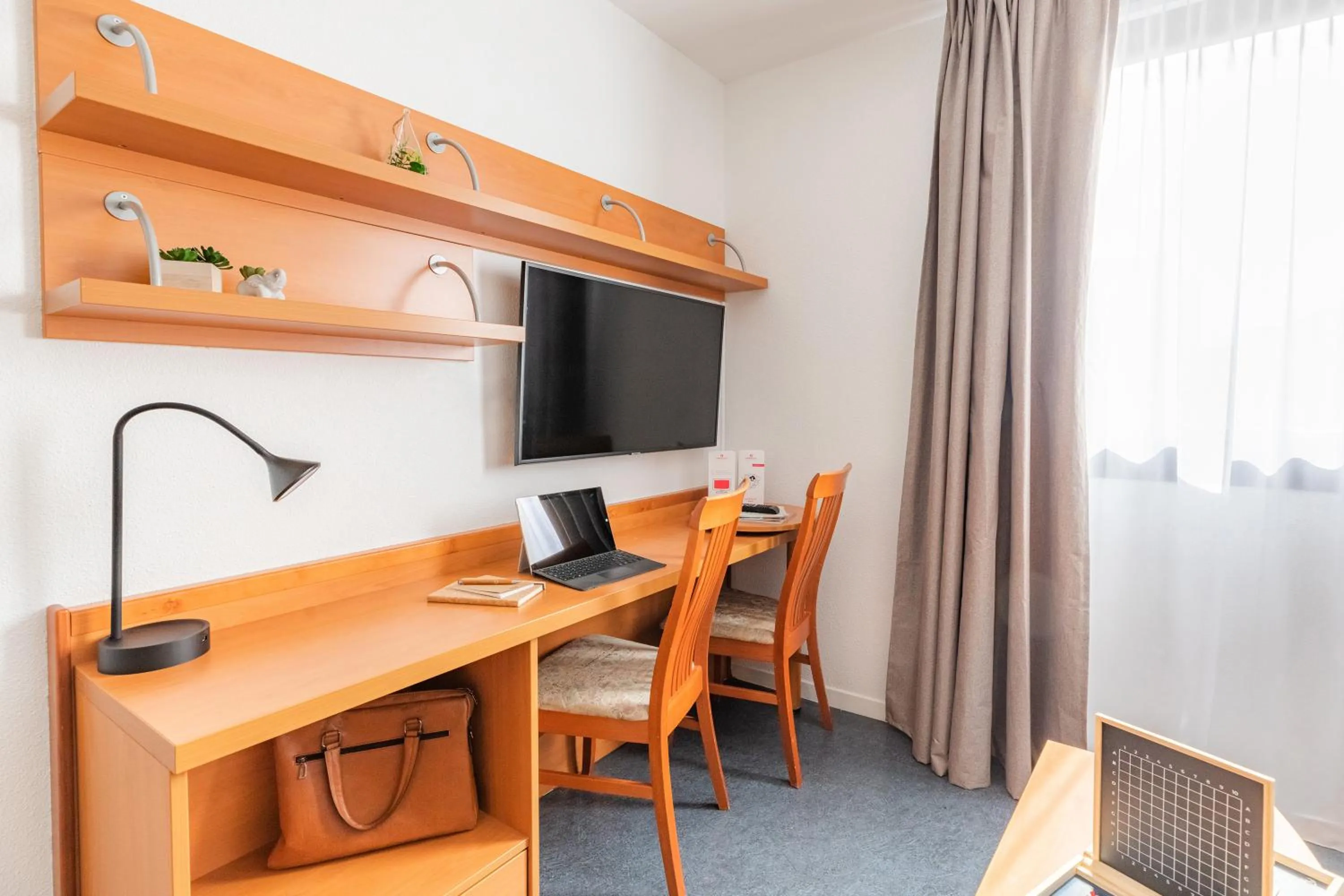 Seating area in Appart’City Confort Lyon Gerland