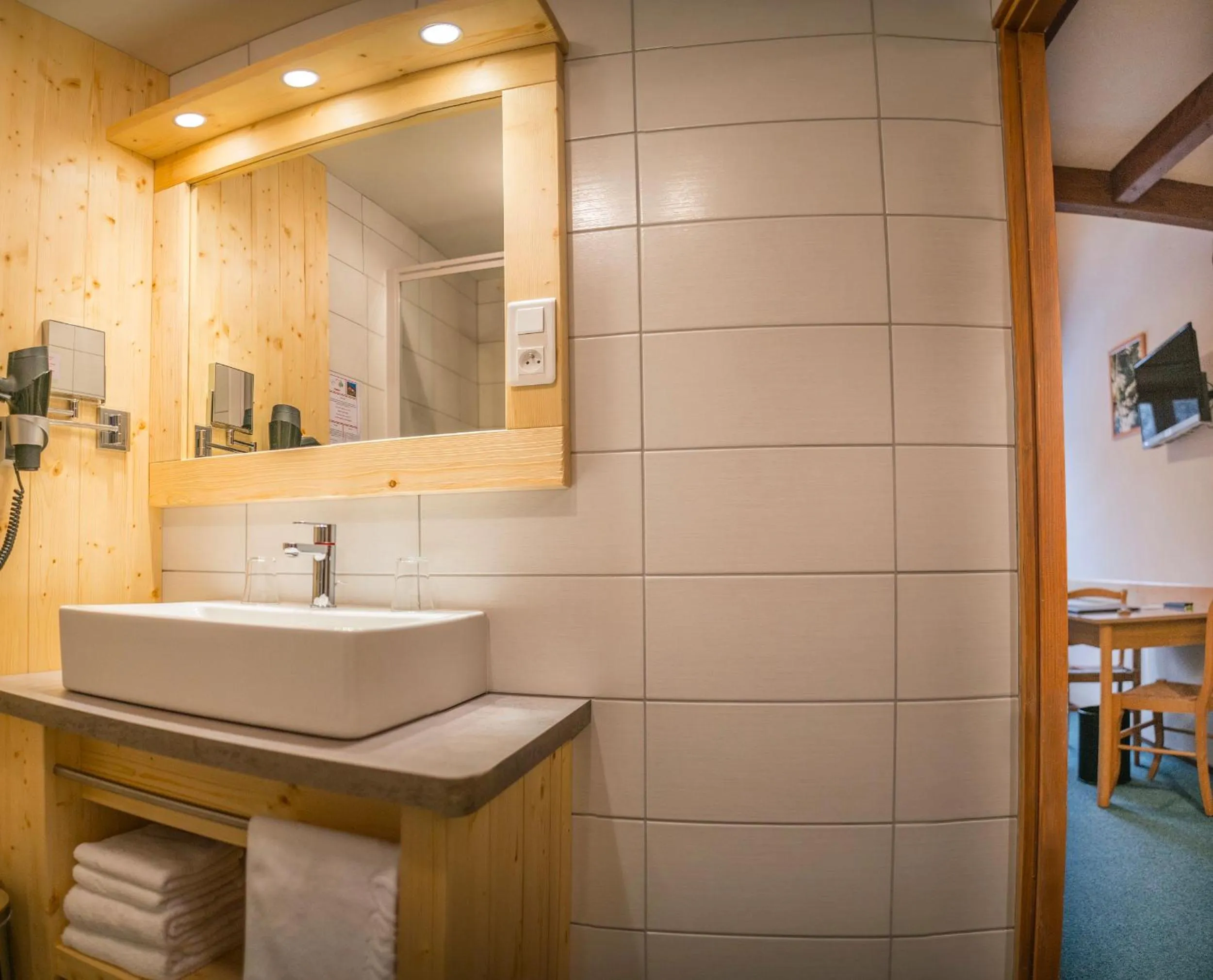 Bathroom in Logis Hôtel Le Vétiné