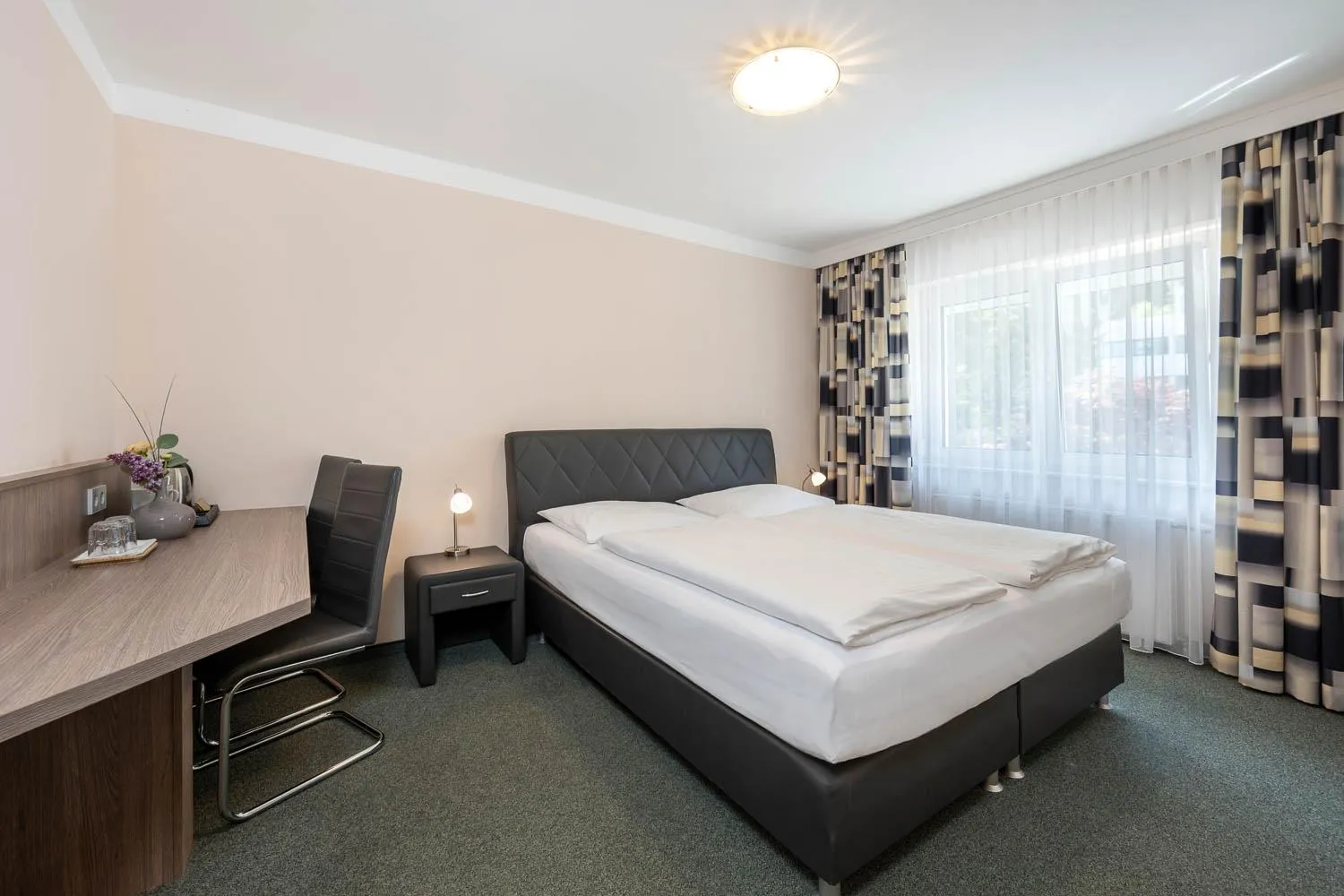 Bed in Hotel Ganslhof - Adults only