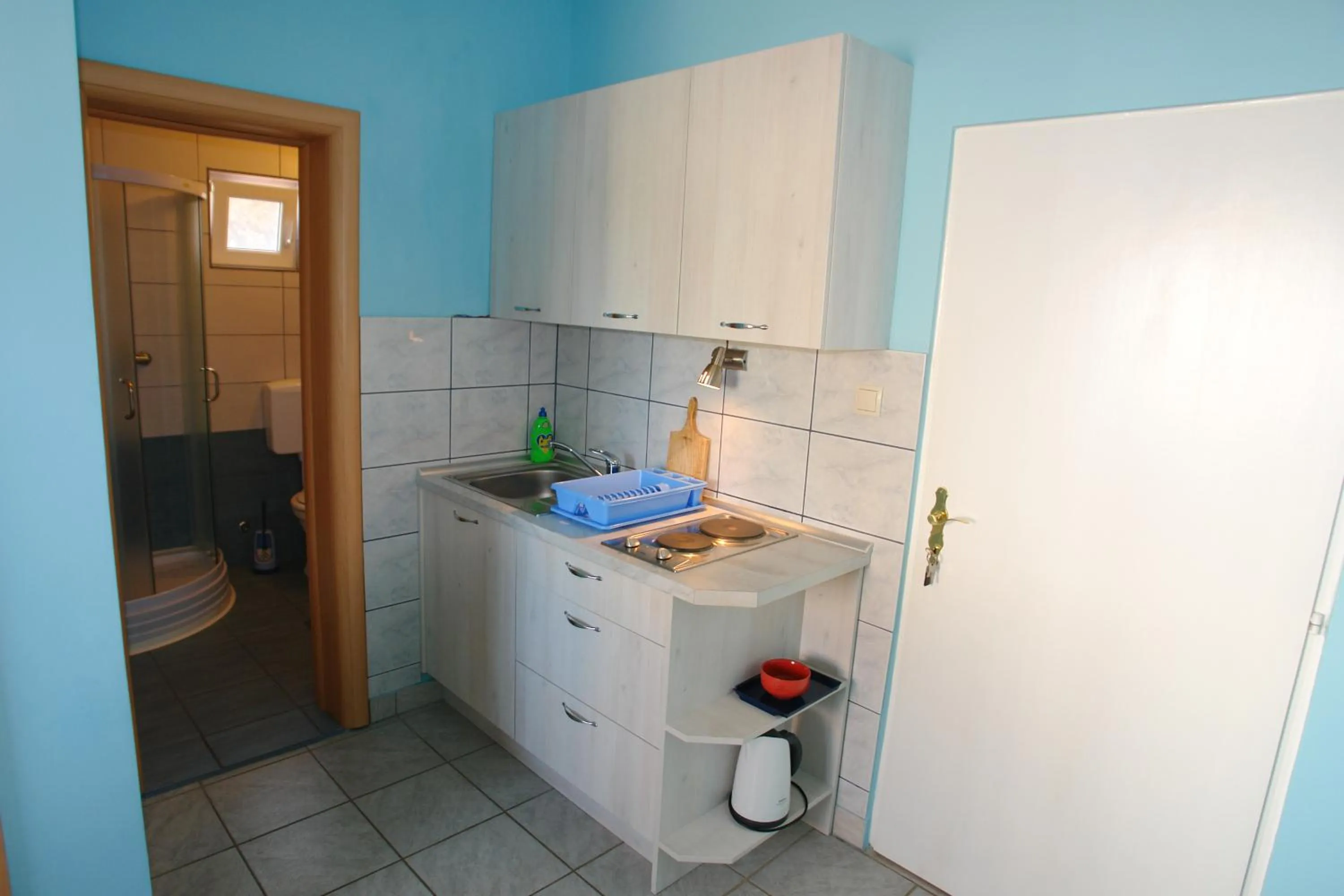 Kitchen or kitchenette in Apartments Andro