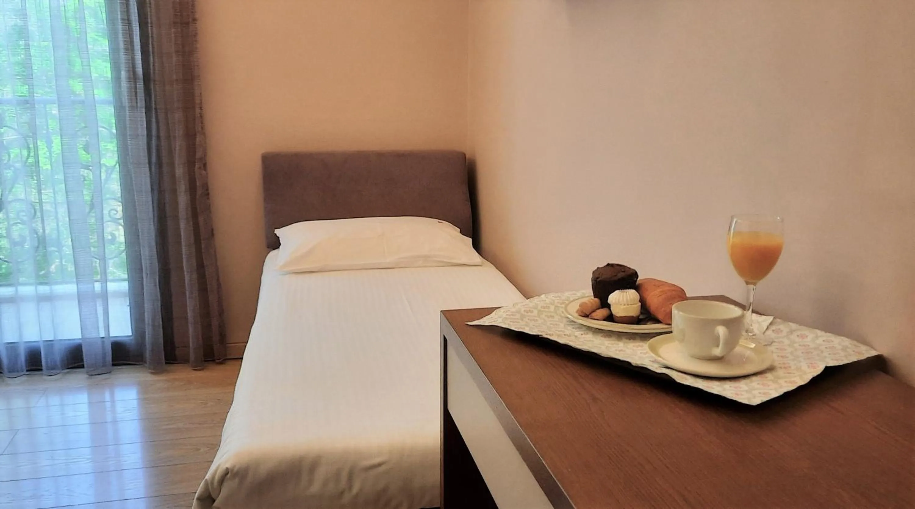 Bed in Olympic Fashion Hotels