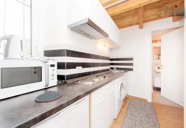 Kitchen or kitchenette in HT Residence Maximus