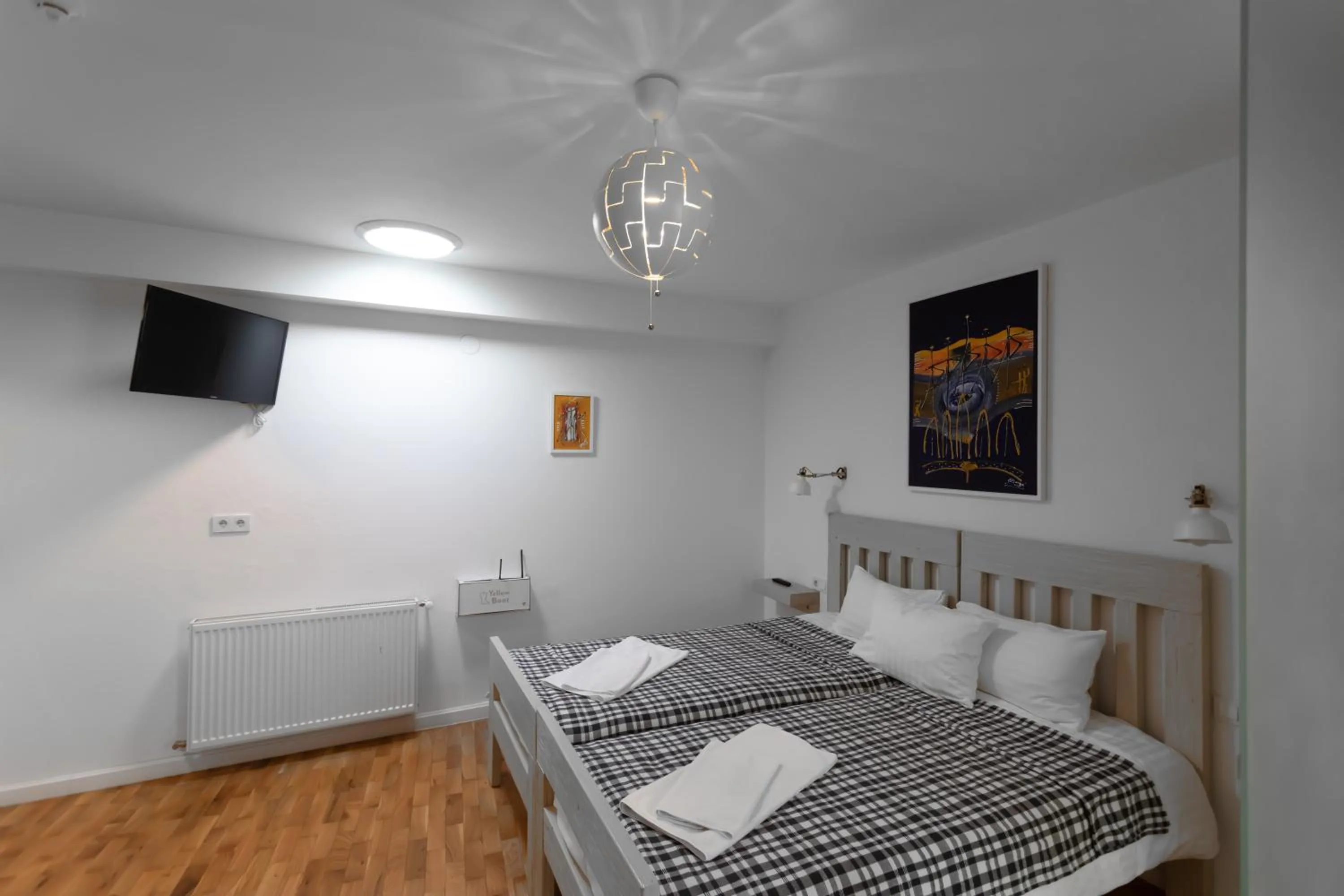 Bed in YellowBoot Aparthotel