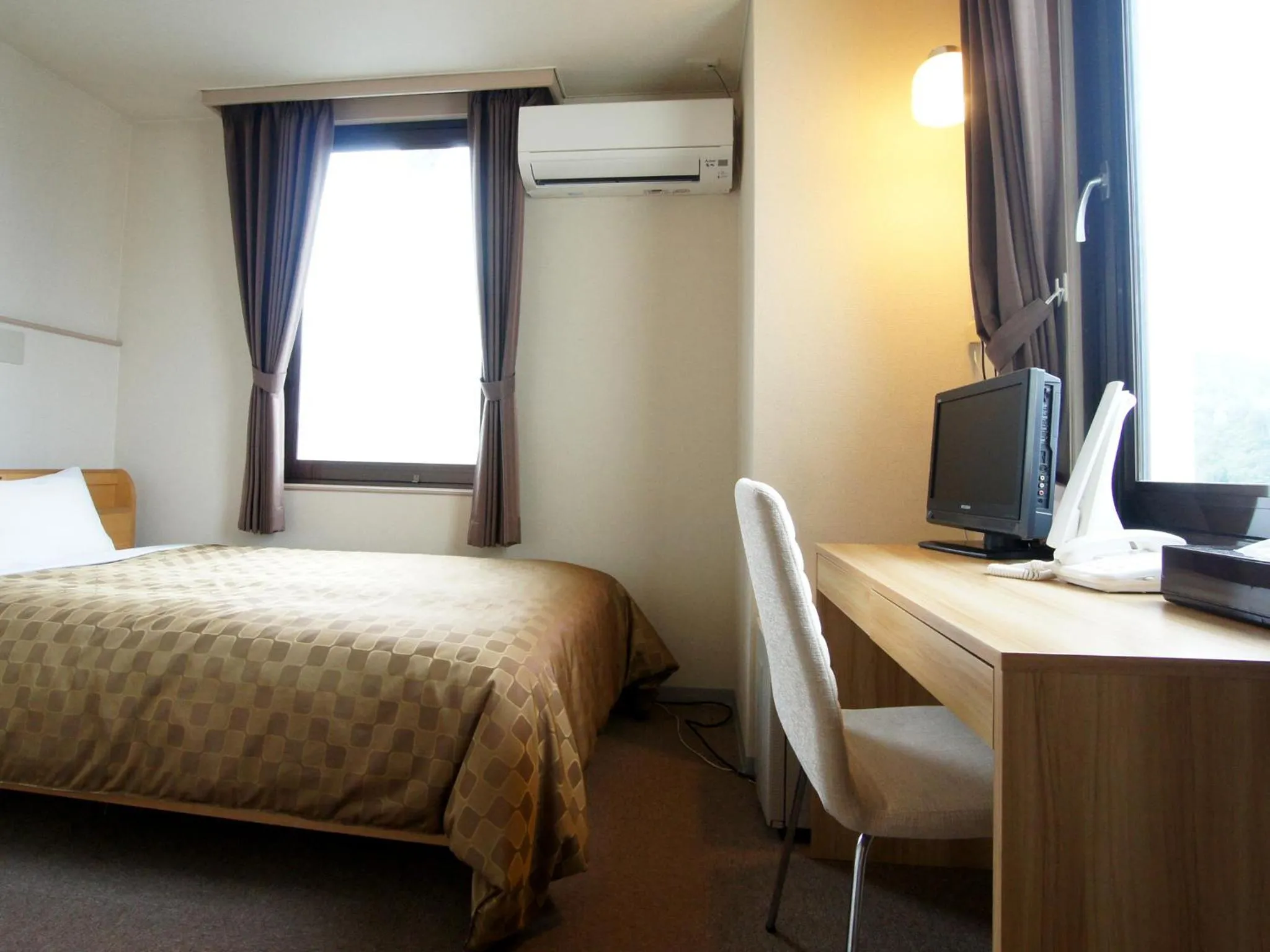 Photo of the whole room, Bed in Hotel Trend Iwakuni