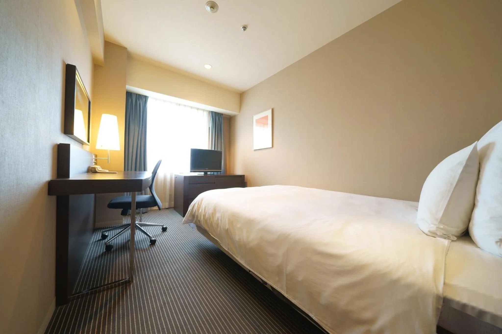 Photo of the whole room, Bed in ANA Crowne Plaza Hiroshima by IHG
