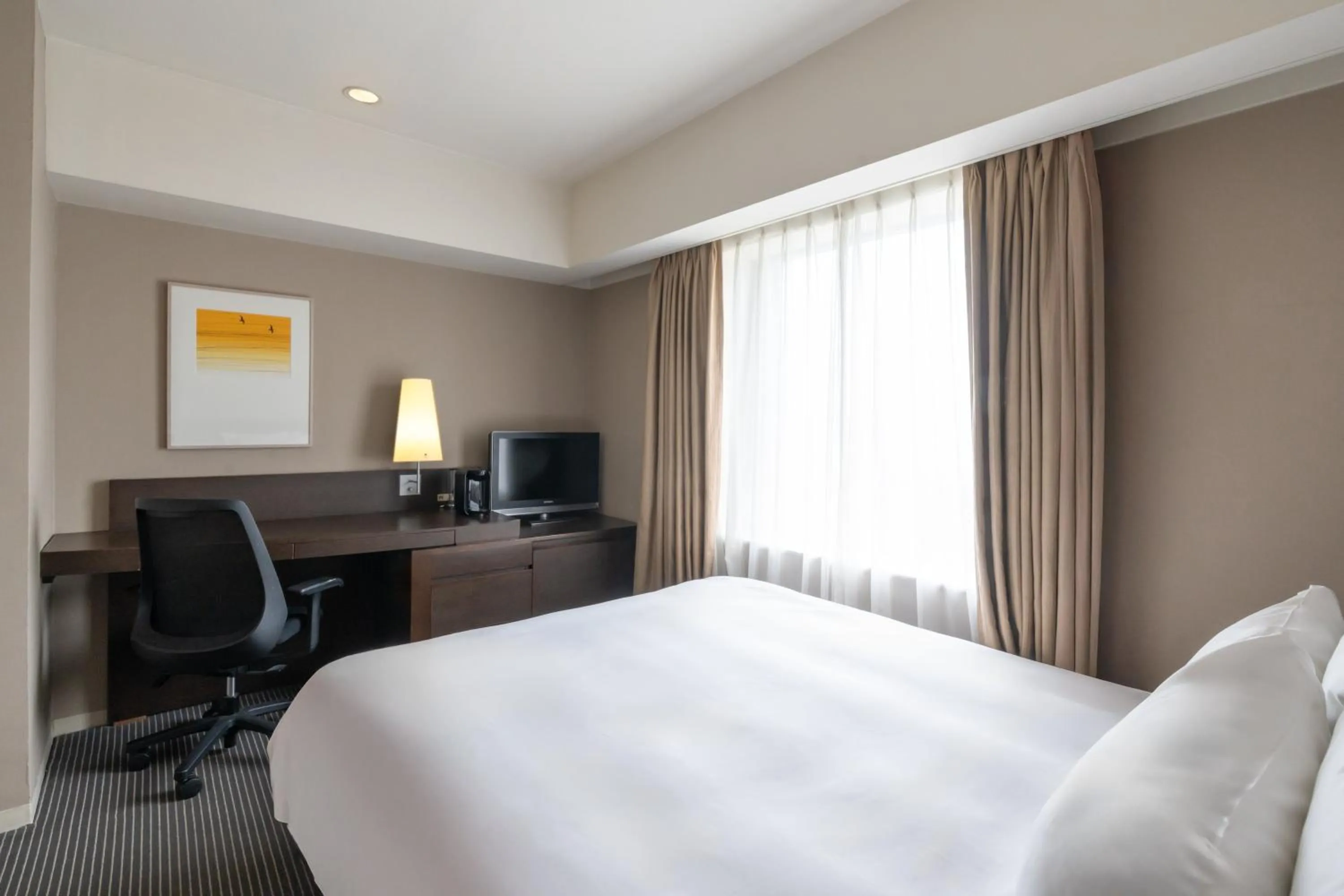 Photo of the whole room, Bed in ANA Crowne Plaza Hiroshima by IHG