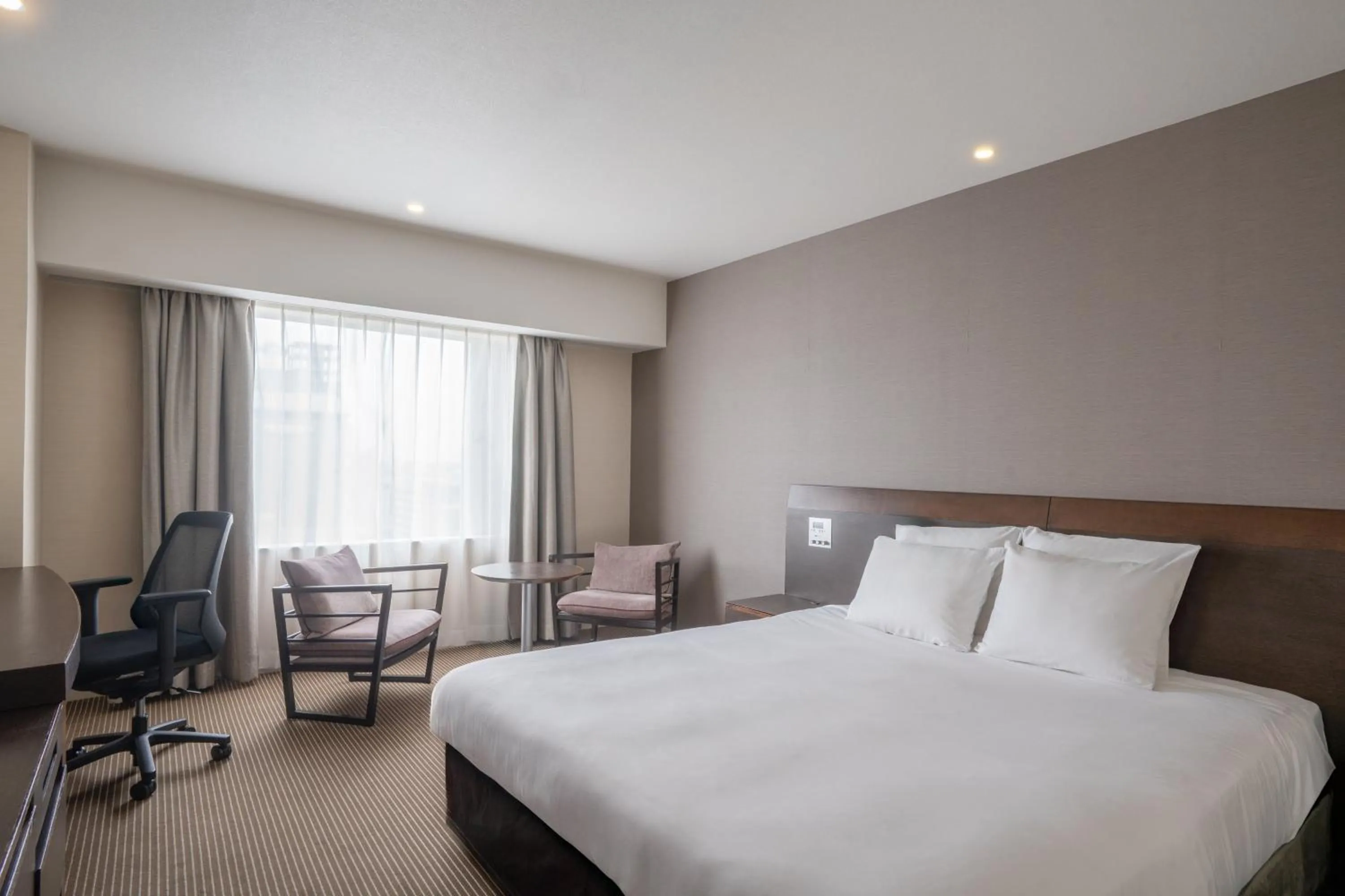 Photo of the whole room, Bed in ANA Crowne Plaza Hiroshima by IHG