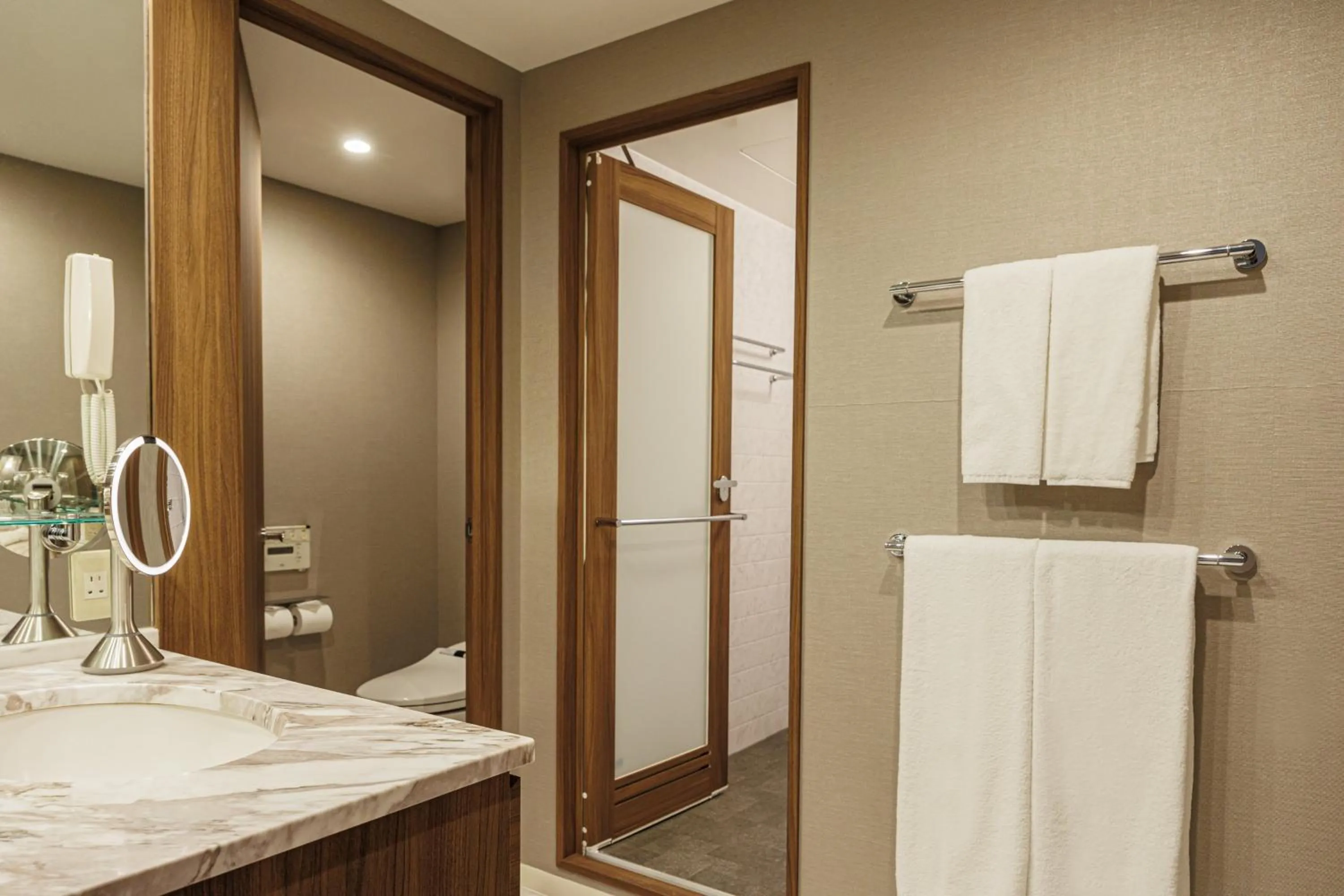 Bathroom in ANA Crowne Plaza Hiroshima by IHG