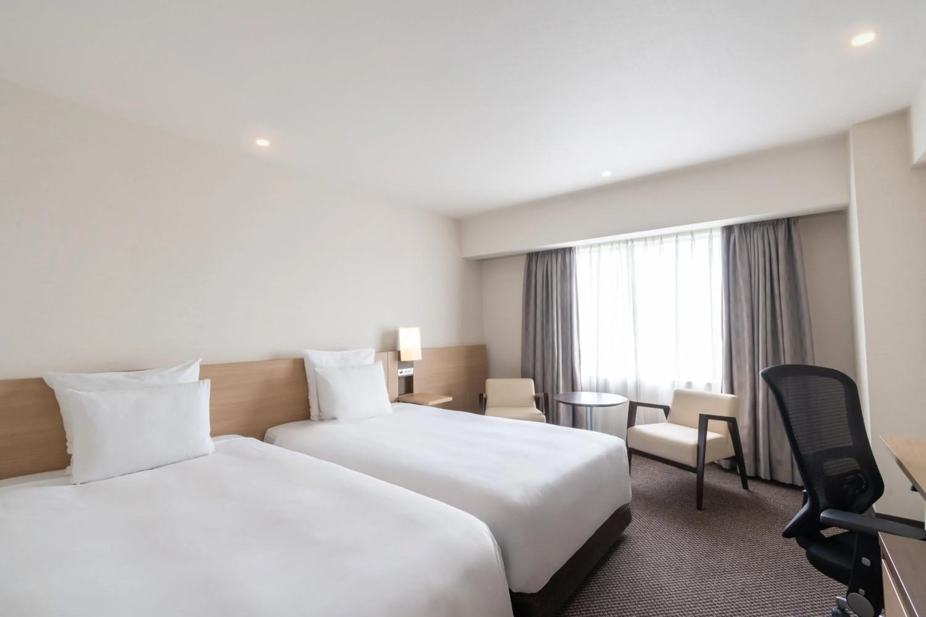 Photo of the whole room, Bed in ANA Crowne Plaza Hiroshima by IHG