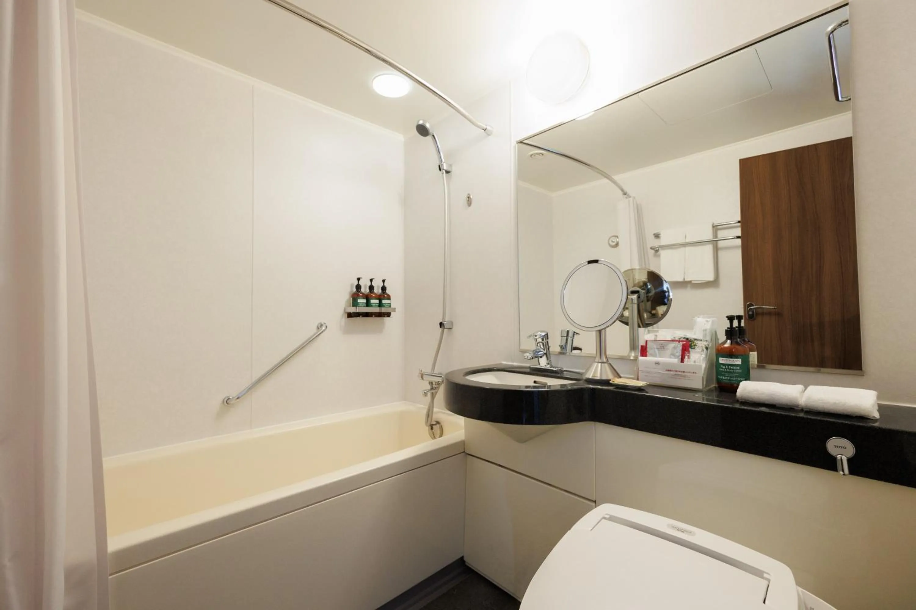 Bathroom in ANA Crowne Plaza Hiroshima by IHG