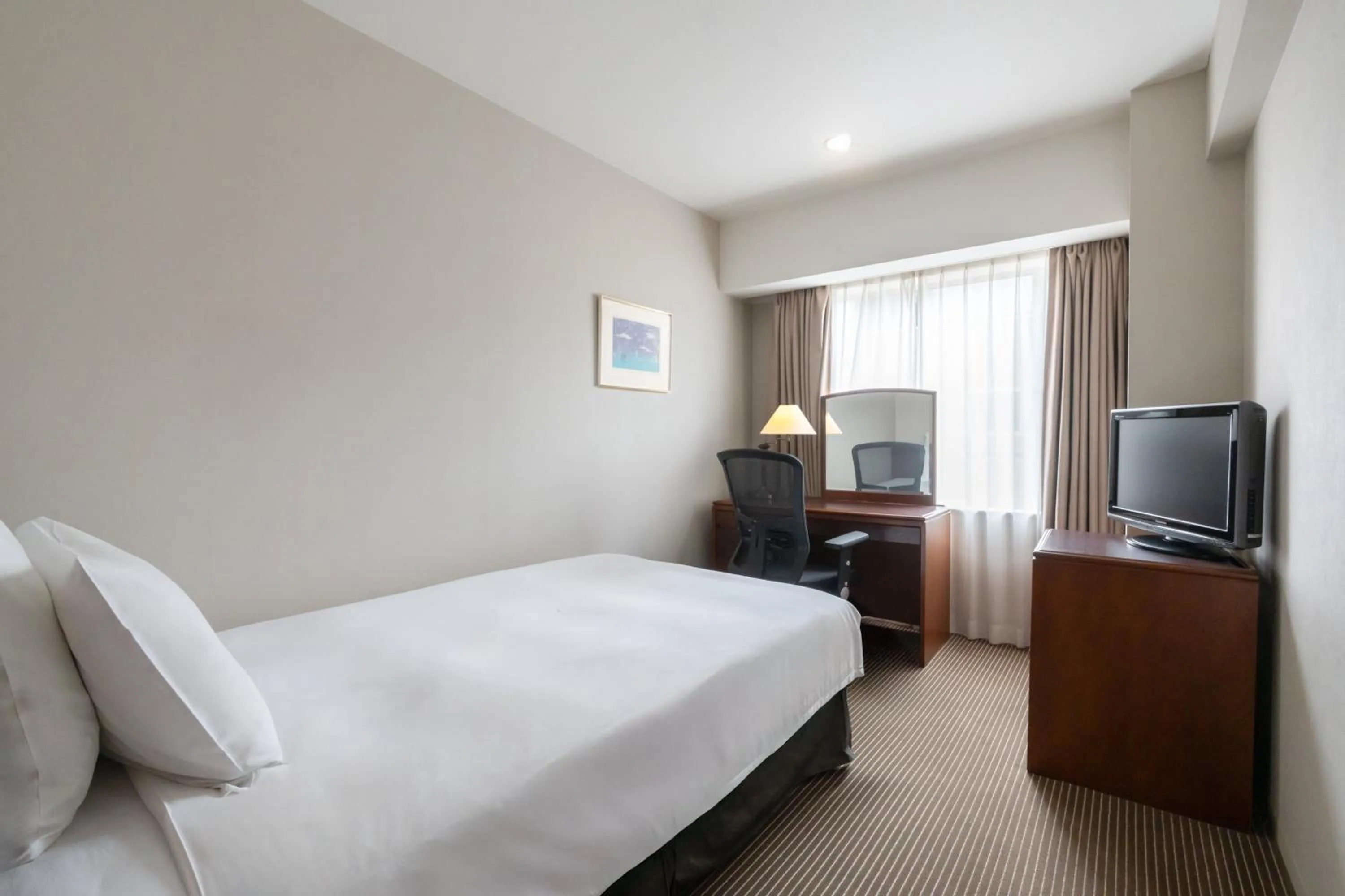 Photo of the whole room, Bed in ANA Crowne Plaza Hiroshima by IHG