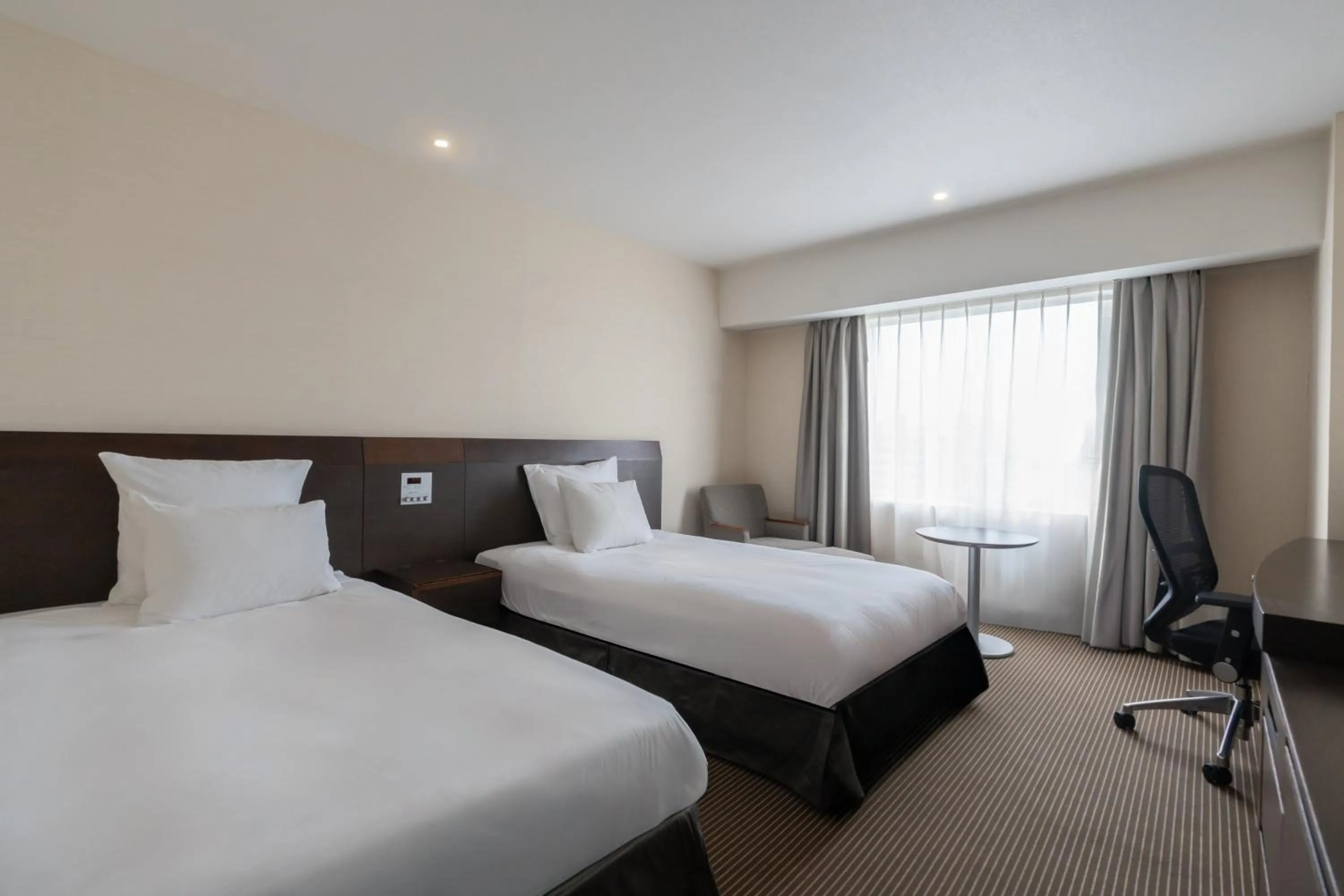 Photo of the whole room, Bed in ANA Crowne Plaza Hiroshima by IHG