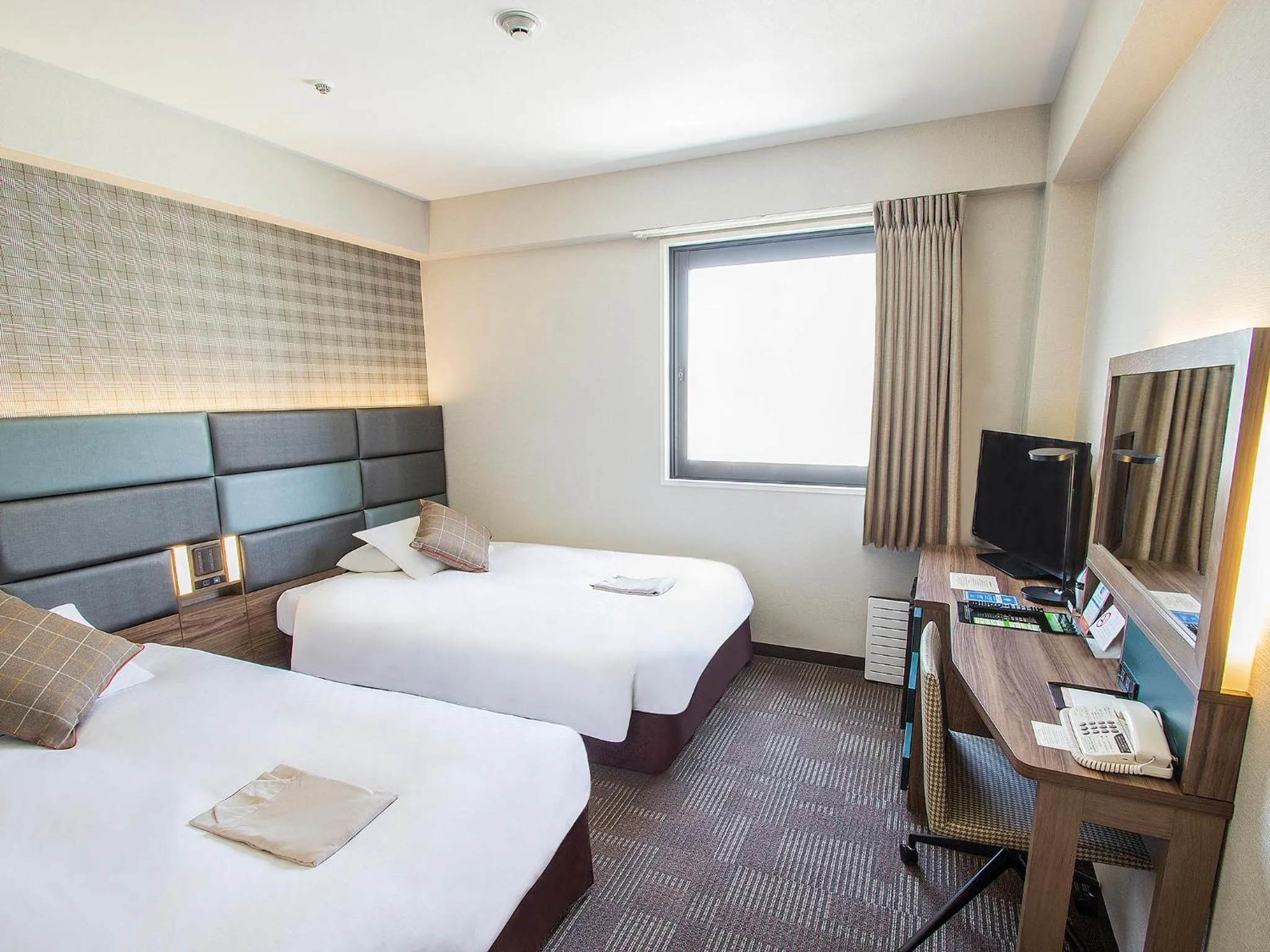 Photo of the whole room, Bed in Hearton Hotel Shinsaibashi