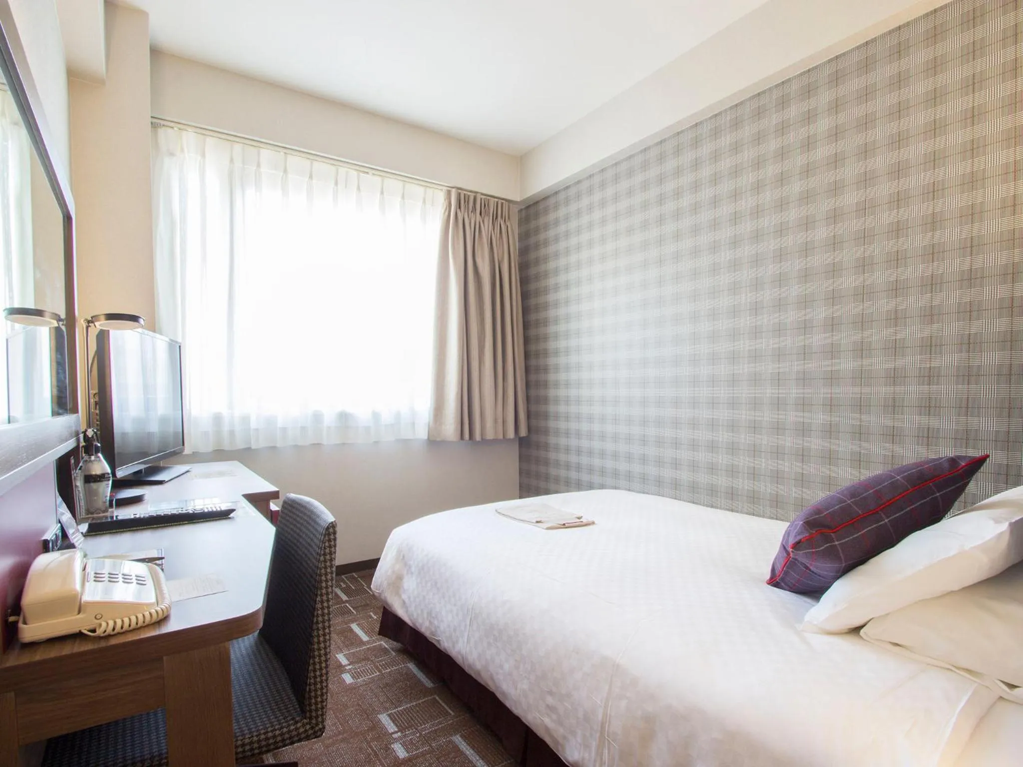 Photo of the whole room, Bed in Hearton Hotel Shinsaibashi