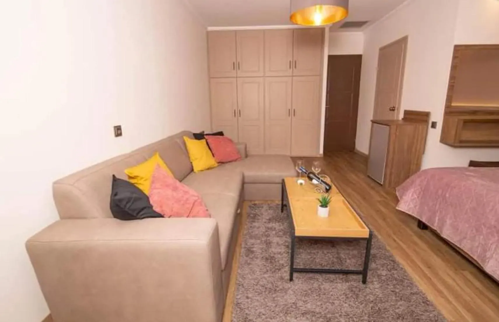 Living room, Bed in Mont Helmos Hotel