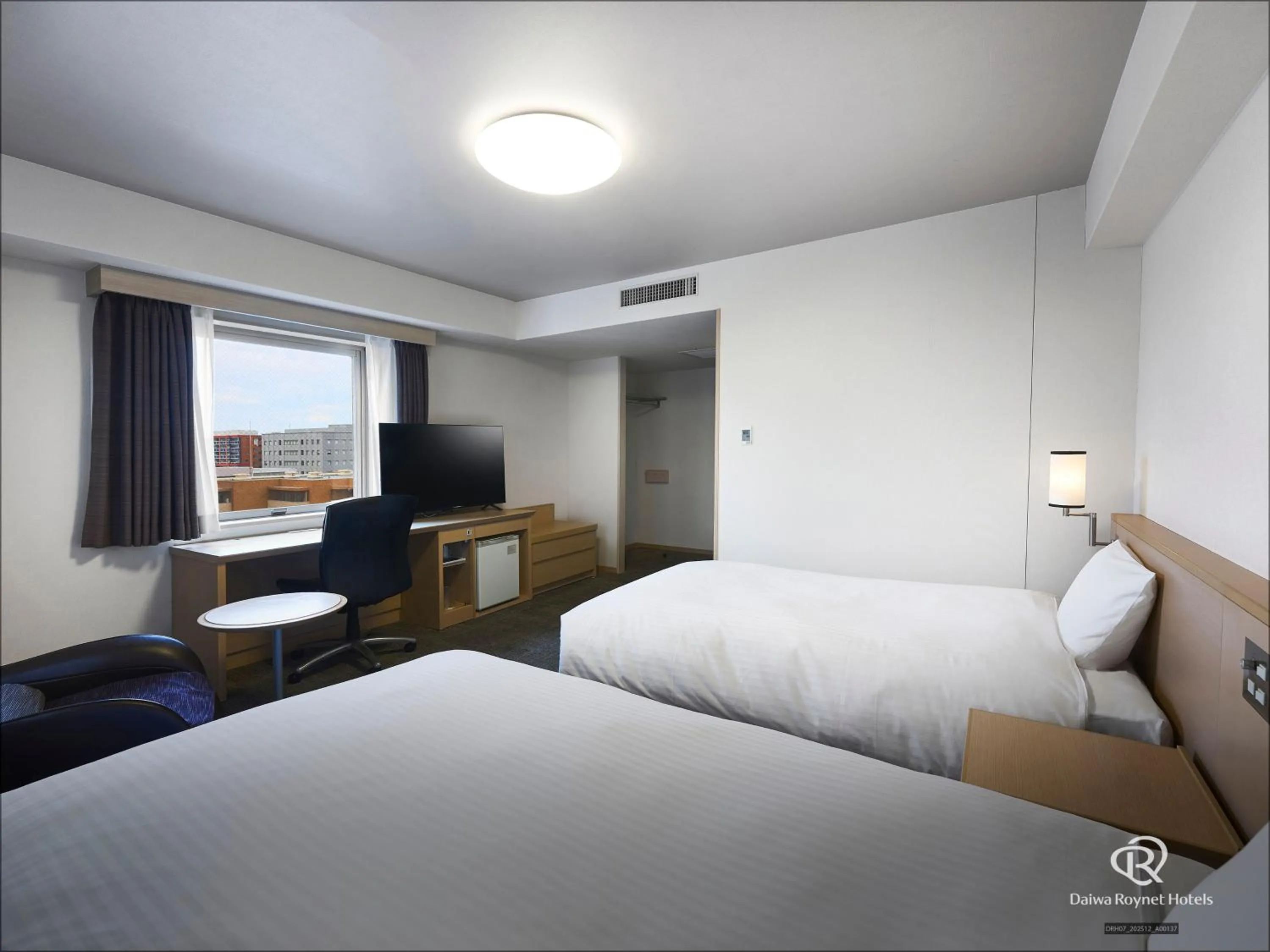 Photo of the whole room, Bed in Daiwa Roynet Hotel Hakata-Gion